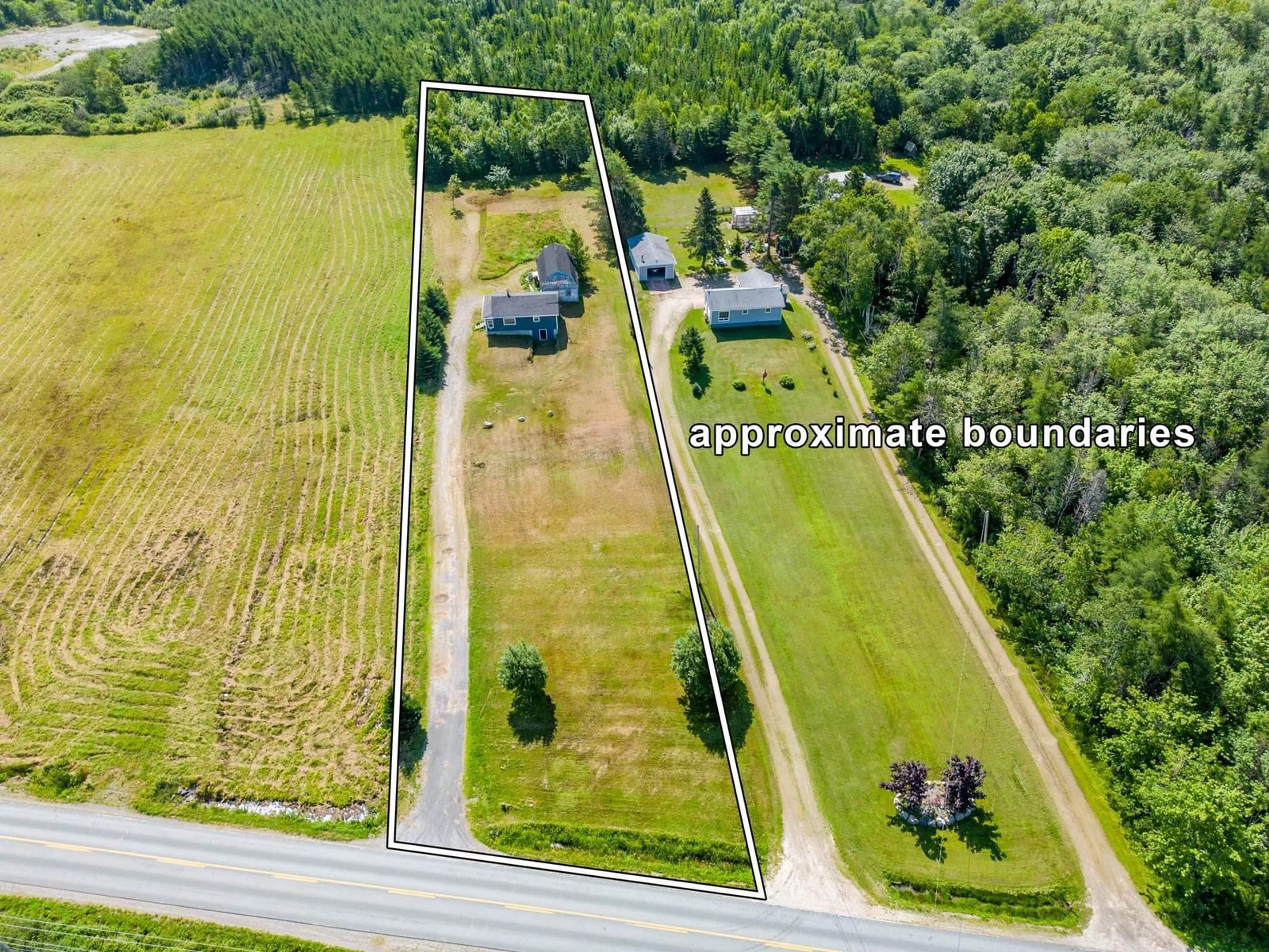 A pic from outside/outdoor area/front of a property/back of a property/a pic from drone, unknown for 590 Second Division Road, Meteghan Nova Scotia B0W 2L0