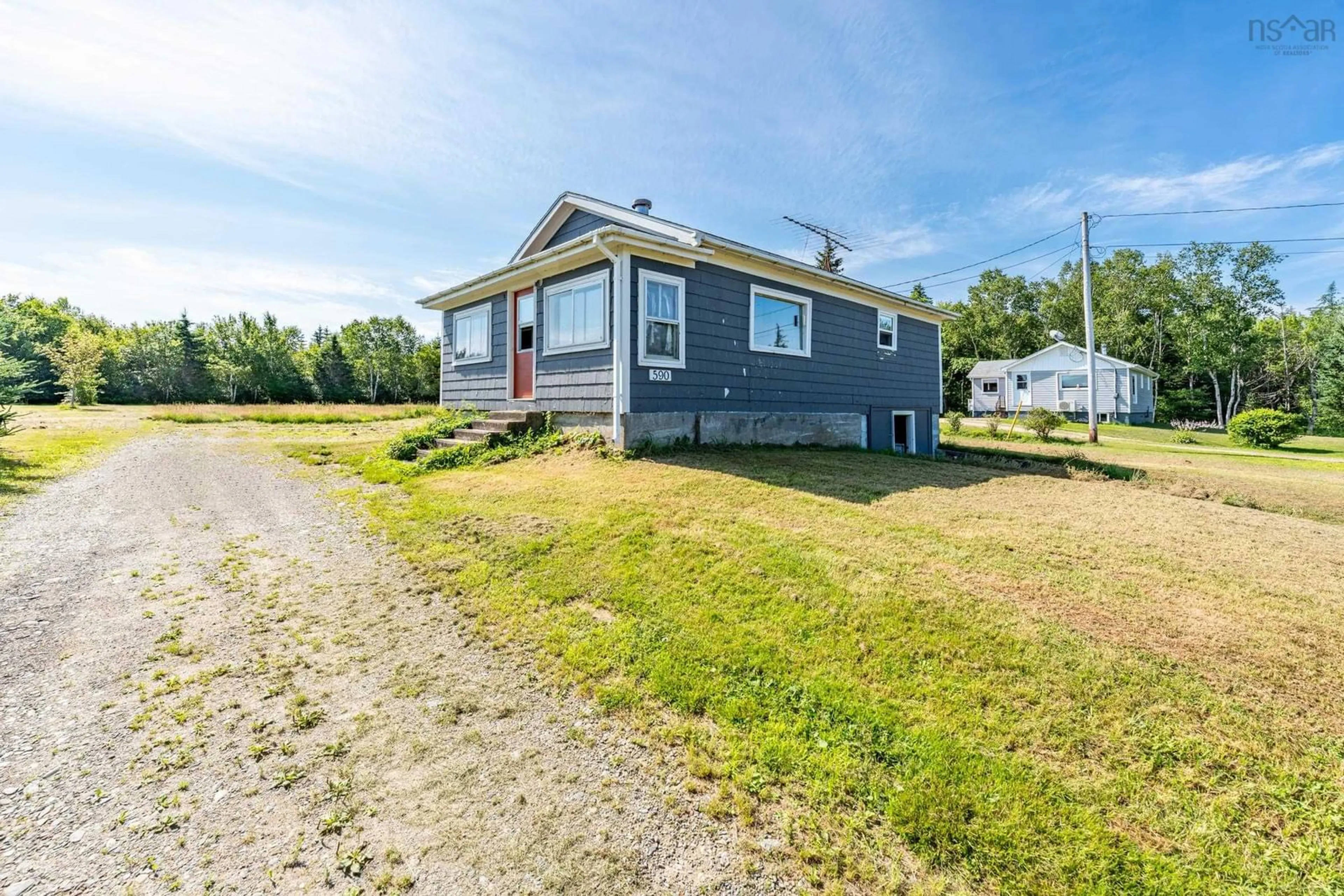 A pic from outside/outdoor area/front of a property/back of a property/a pic from drone, street for 590 Second Division Road, Meteghan Nova Scotia B0W 2L0