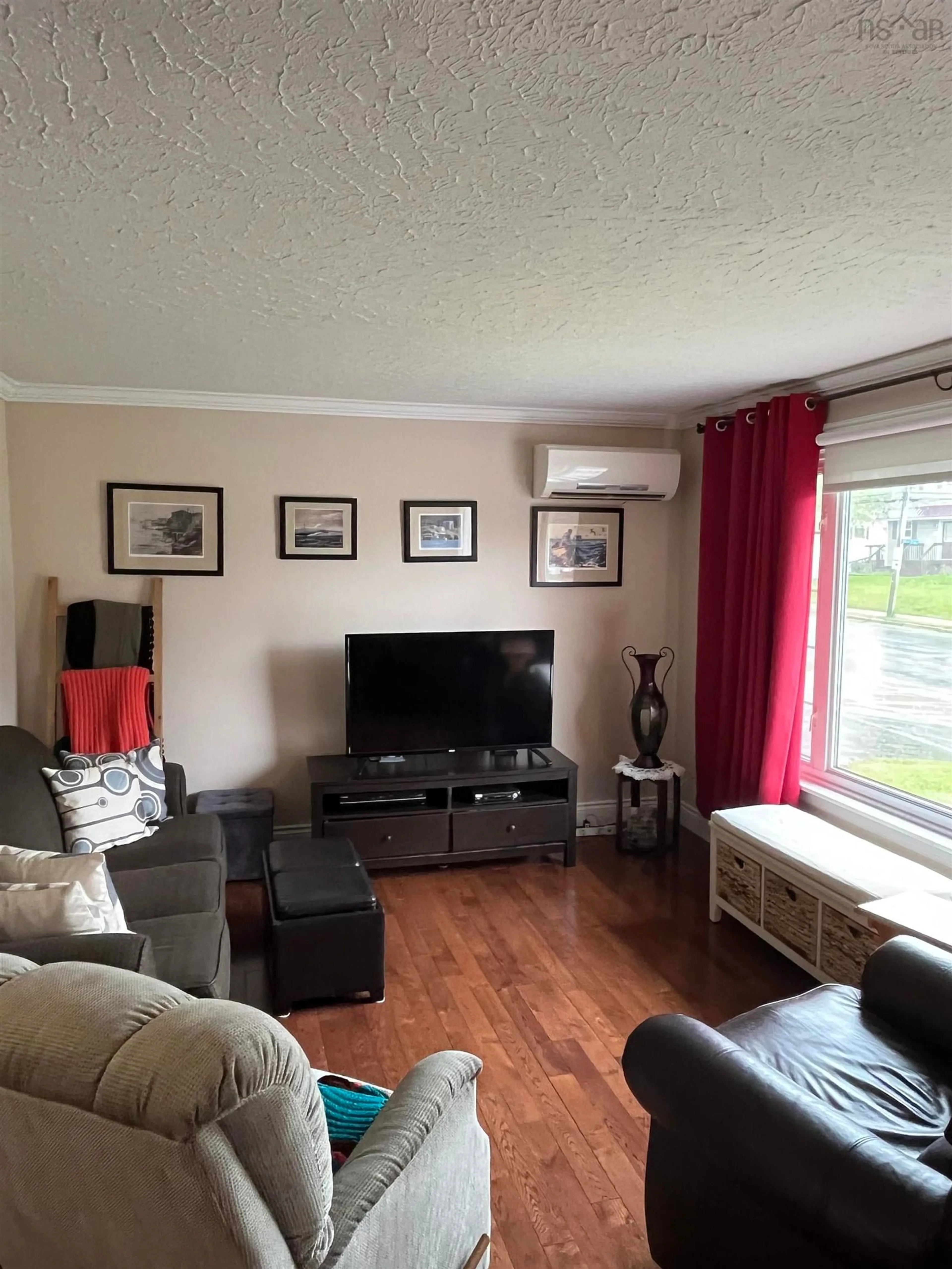 Living room with furniture, wood/laminate floor for 87 Curtis Dr, Truro Nova Scotia B2N 3W4