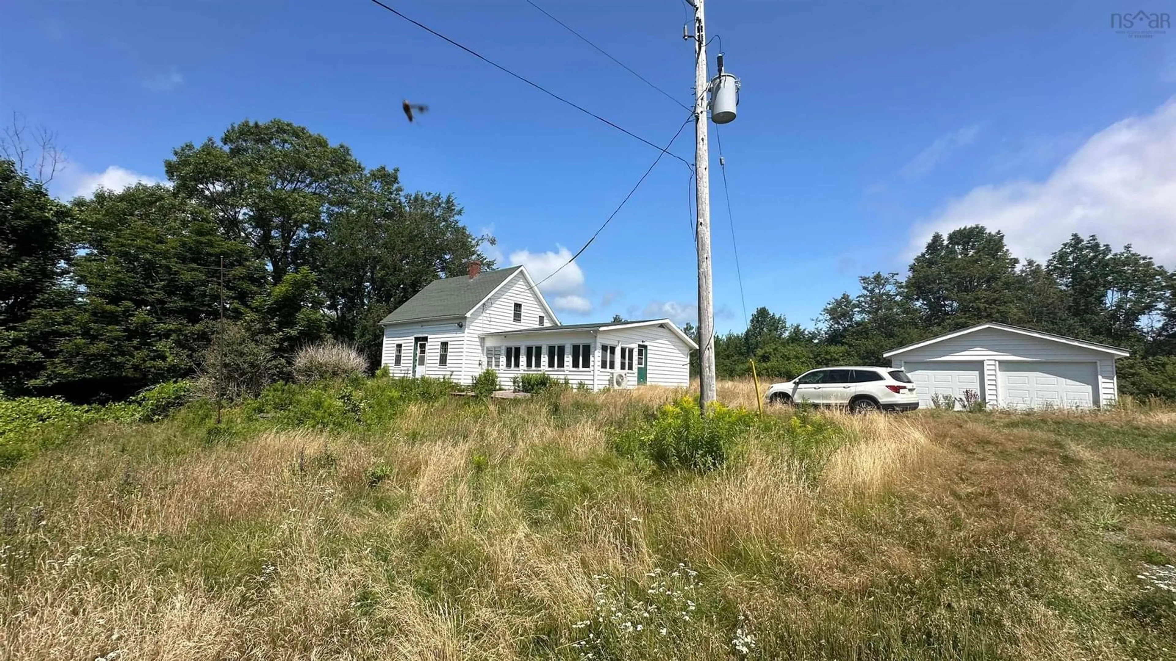 A pic from outside/outdoor area/front of a property/back of a property/a pic from drone, building for 7035 Pictou Landing Rd, Chance Harbour Nova Scotia B0K 1X0