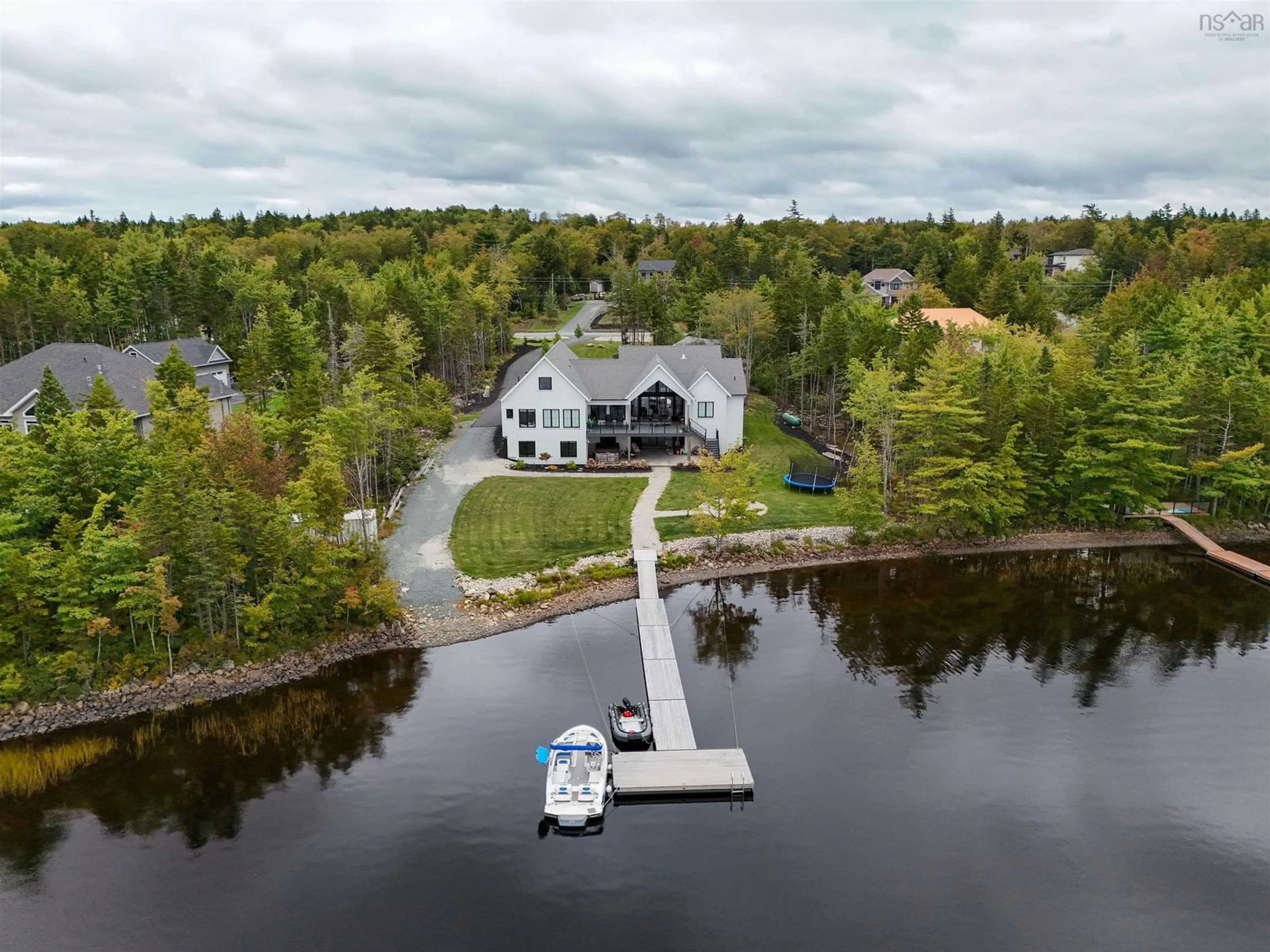 A pic from outside/outdoor area/front of a property/back of a property/a pic from drone, water/lake/river/ocean view for 480 Mccabe Lake Dr, Middle Sackville Nova Scotia B4E 0N6