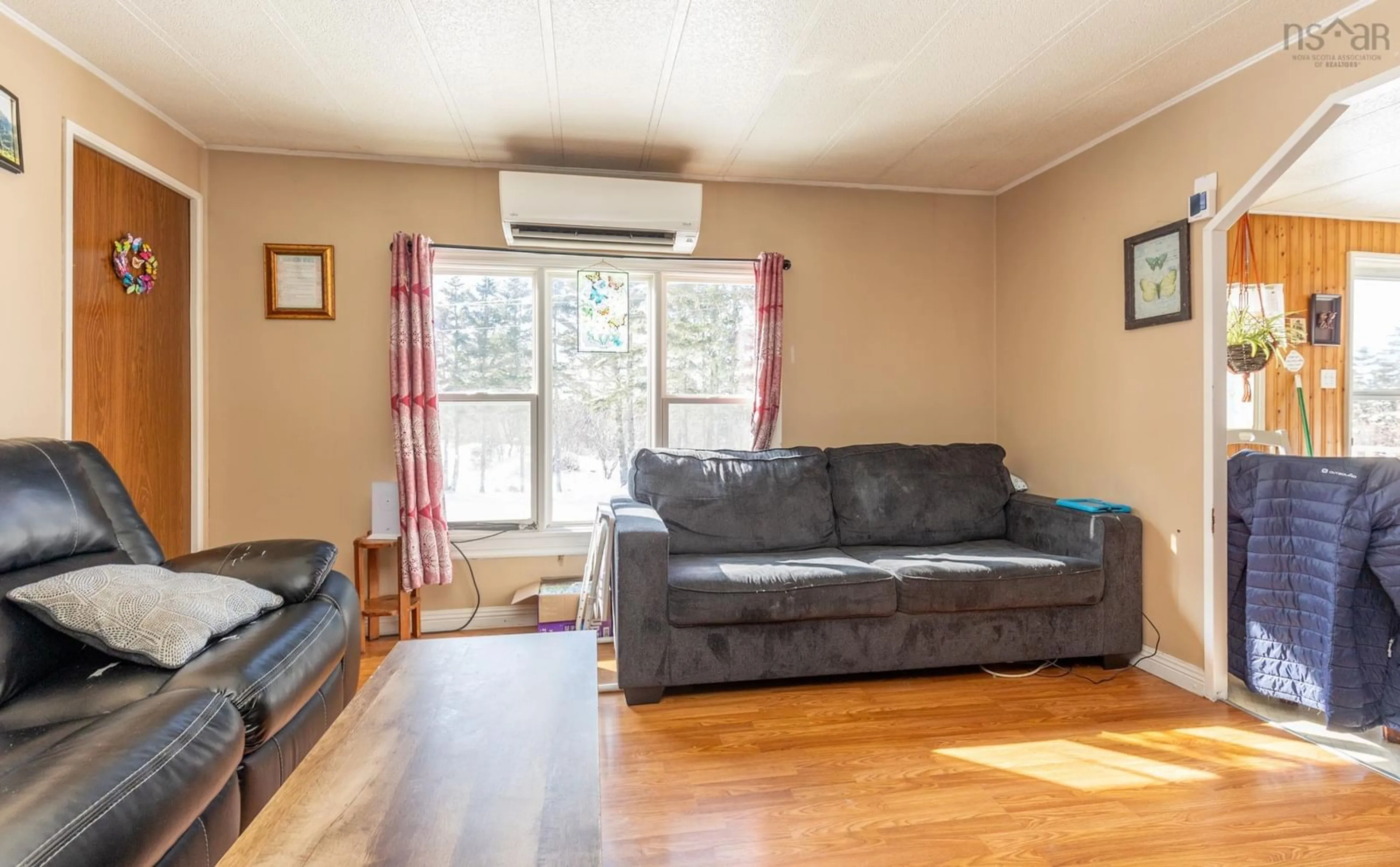 Living room with furniture, wood/laminate floor for 120 Green Rock Drive, South Chegoggin Nova Scotia B5A 4A7