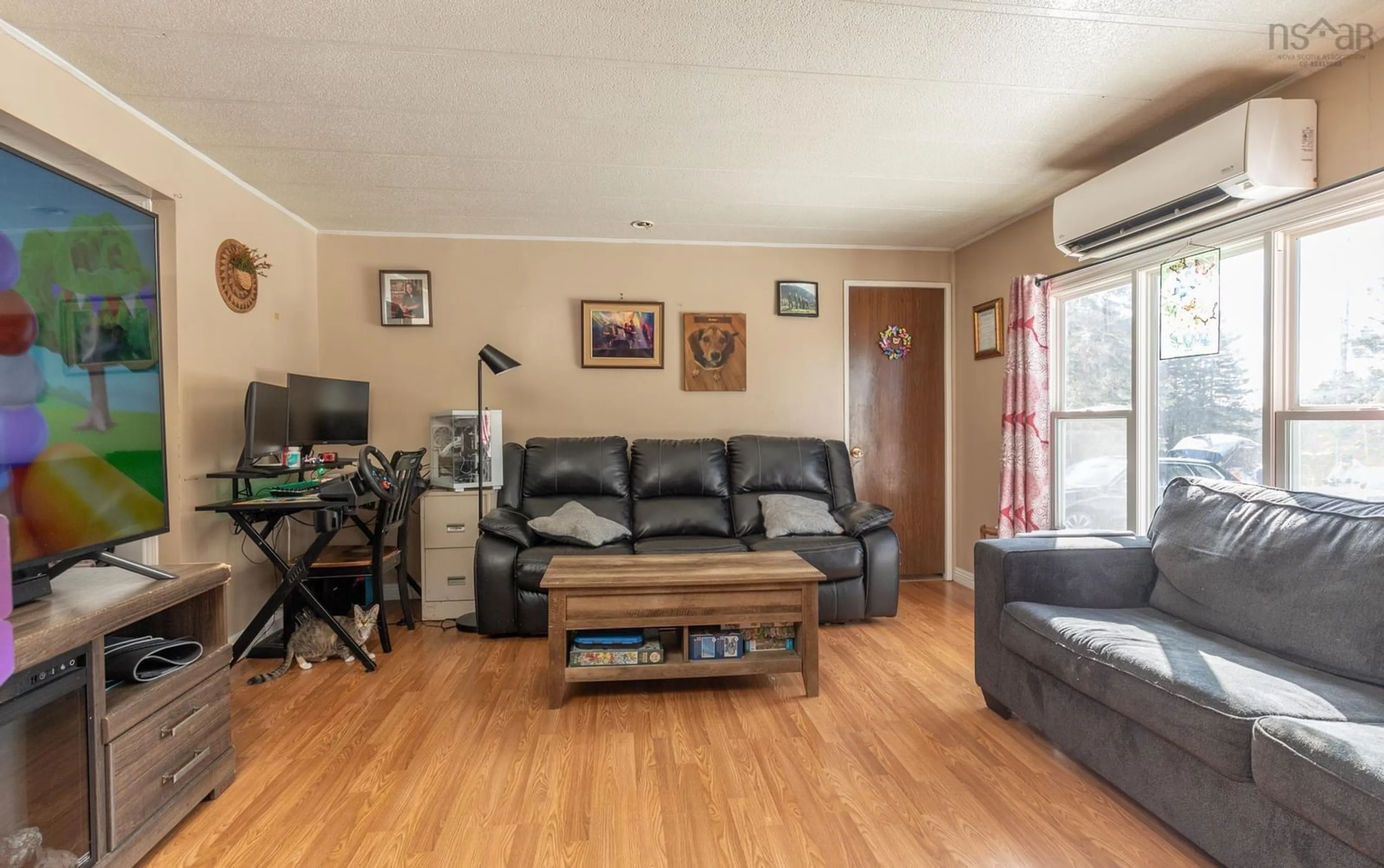 Living room with furniture, wood/laminate floor for 120 Green Rock Drive, South Chegoggin Nova Scotia B5A 4A7