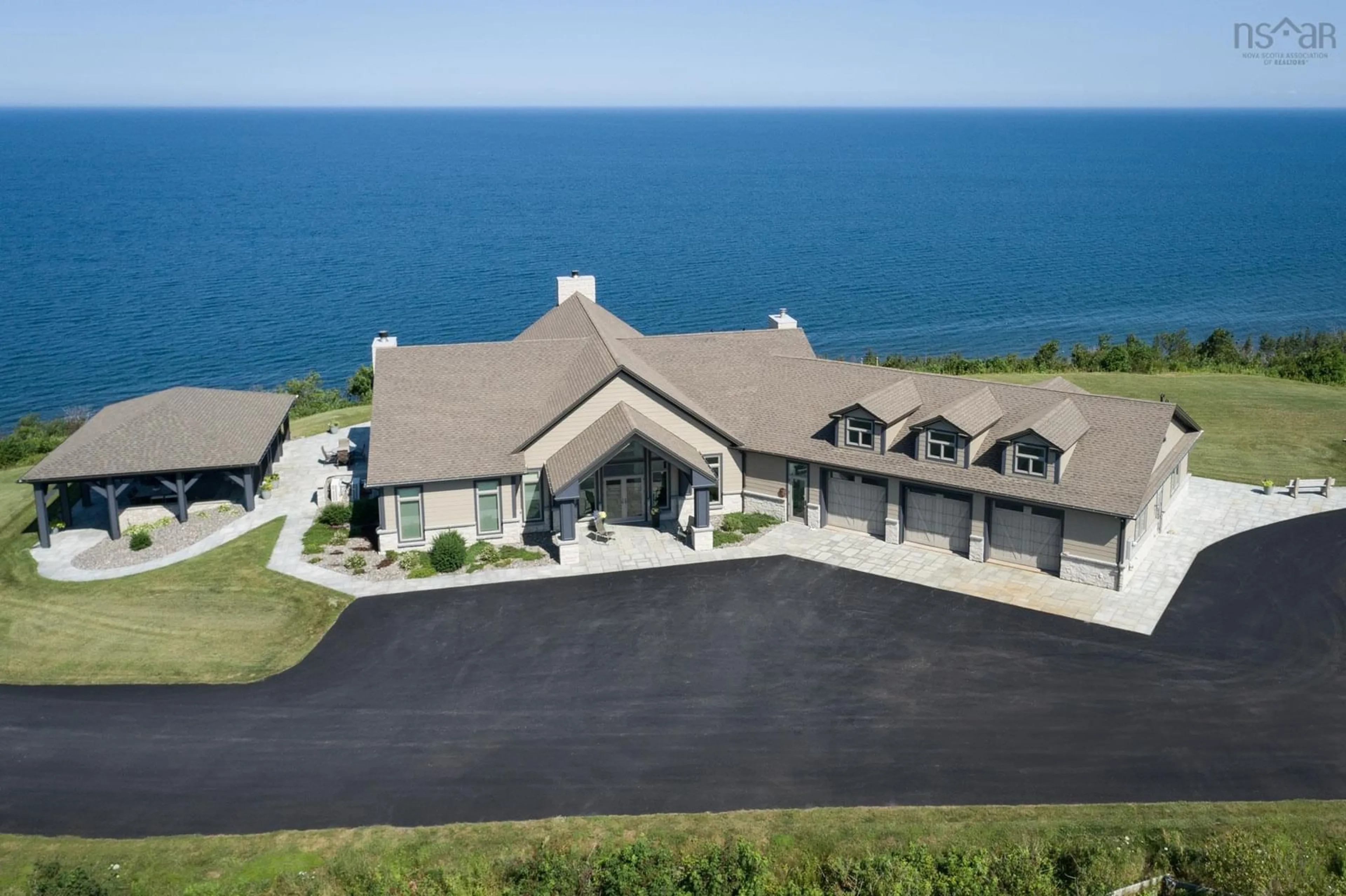 A pic from outside/outdoor area/front of a property/back of a property/a pic from drone, water/lake/river/ocean view for 8482 Highway 337, Georgeville Nova Scotia B2G 2L1