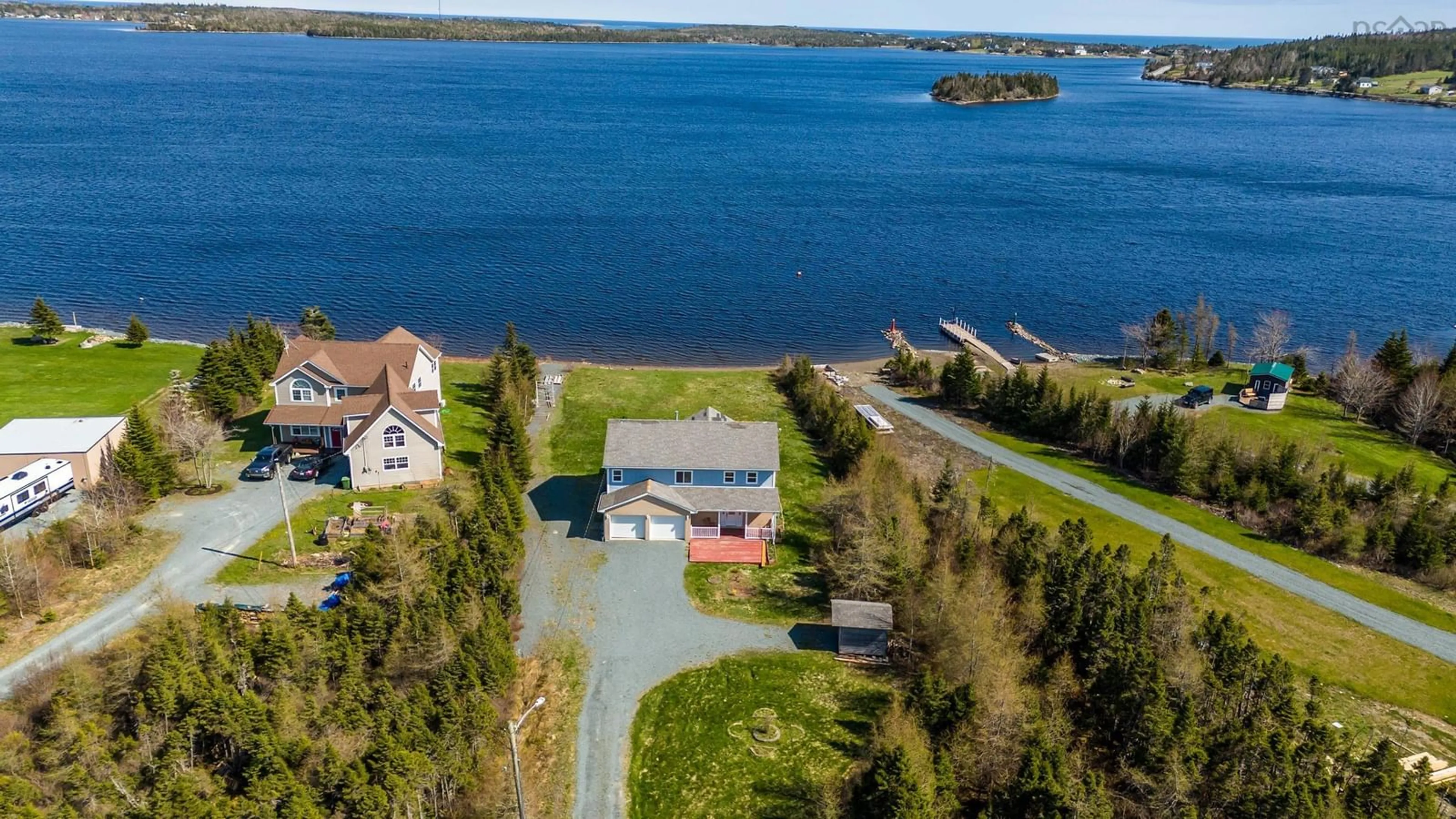 A pic from outside/outdoor area/front of a property/back of a property/a pic from drone, water/lake/river/ocean view for 2066 Crowell Rd, East Lawrencetown Nova Scotia B2Z 1P1