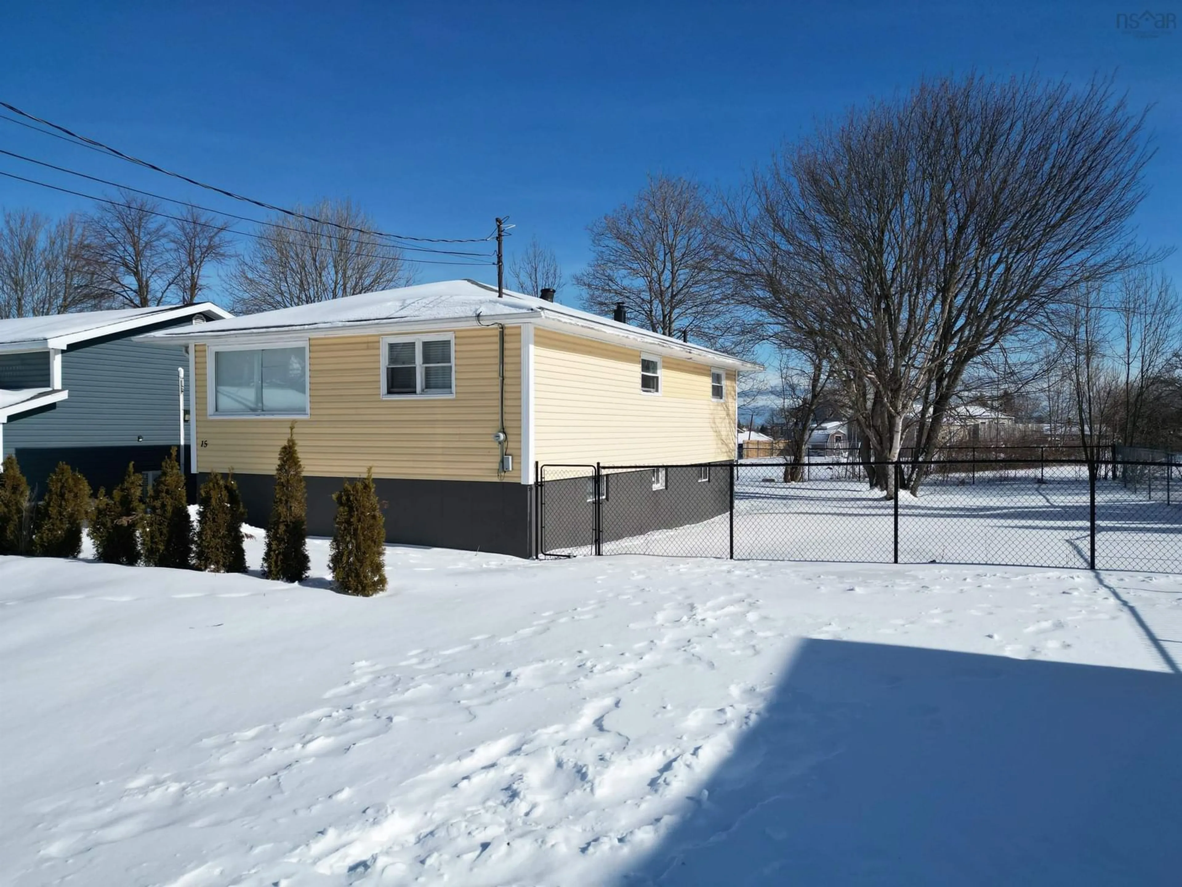 Home with vinyl exterior material, street for 15 Clyde Avenue, Sydney Mines Nova Scotia B1V 2E3