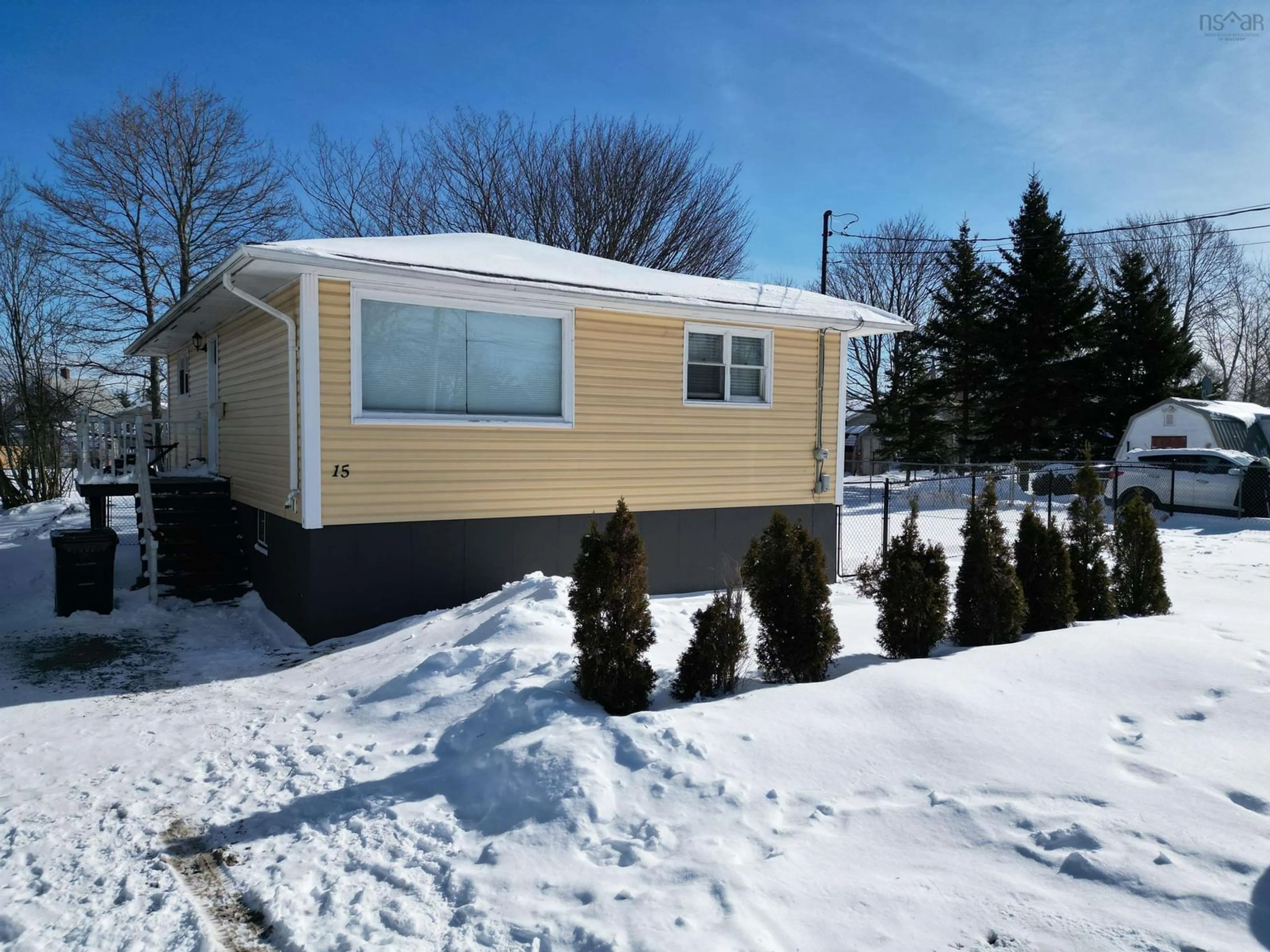 Home with vinyl exterior material, street for 15 Clyde Avenue, Sydney Mines Nova Scotia B1V 2E3