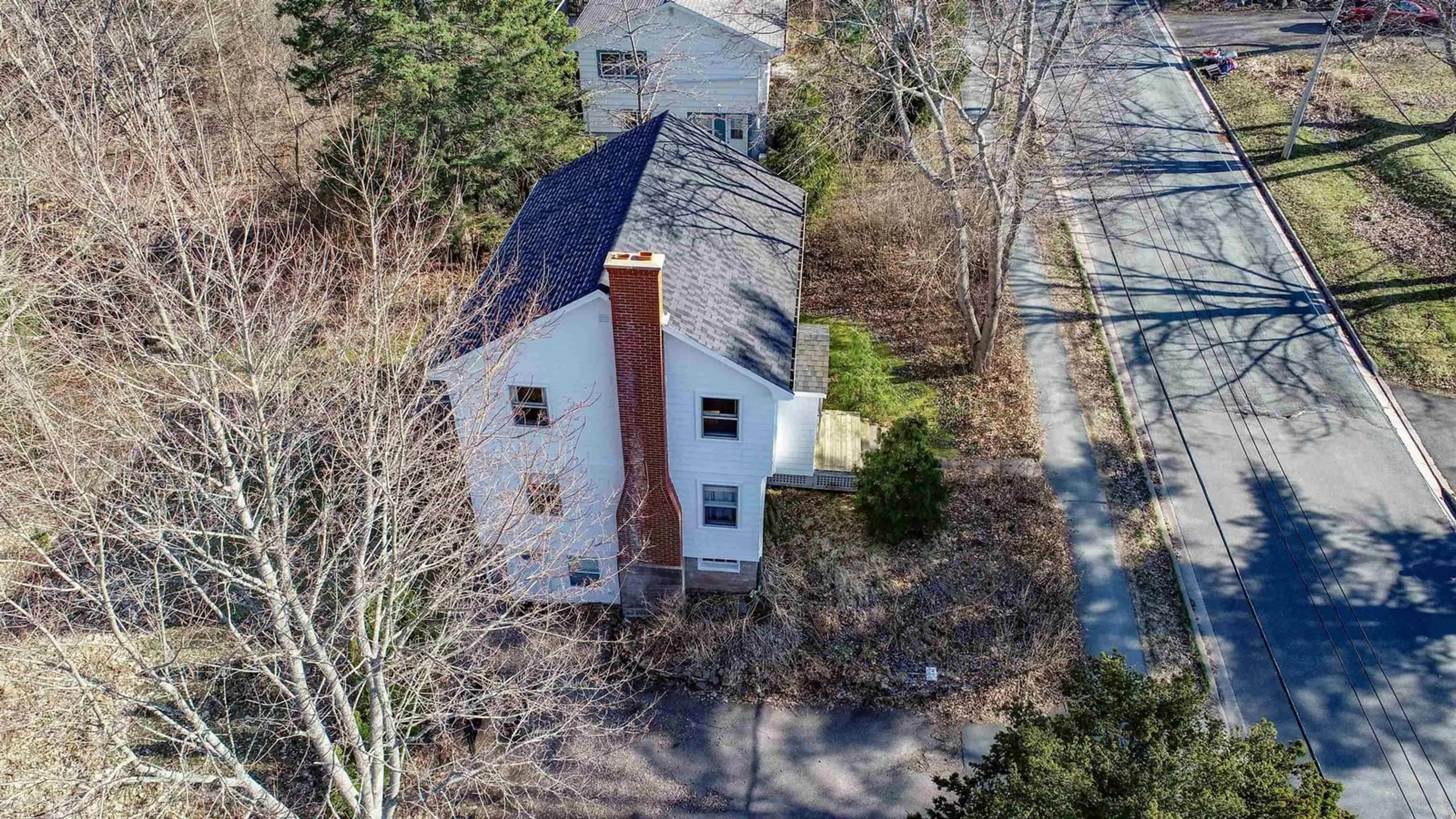 A pic from outside/outdoor area/front of a property/back of a property/a pic from drone, building for 23 Chestnut Ave, Wolfville Nova Scotia B4P 1V7