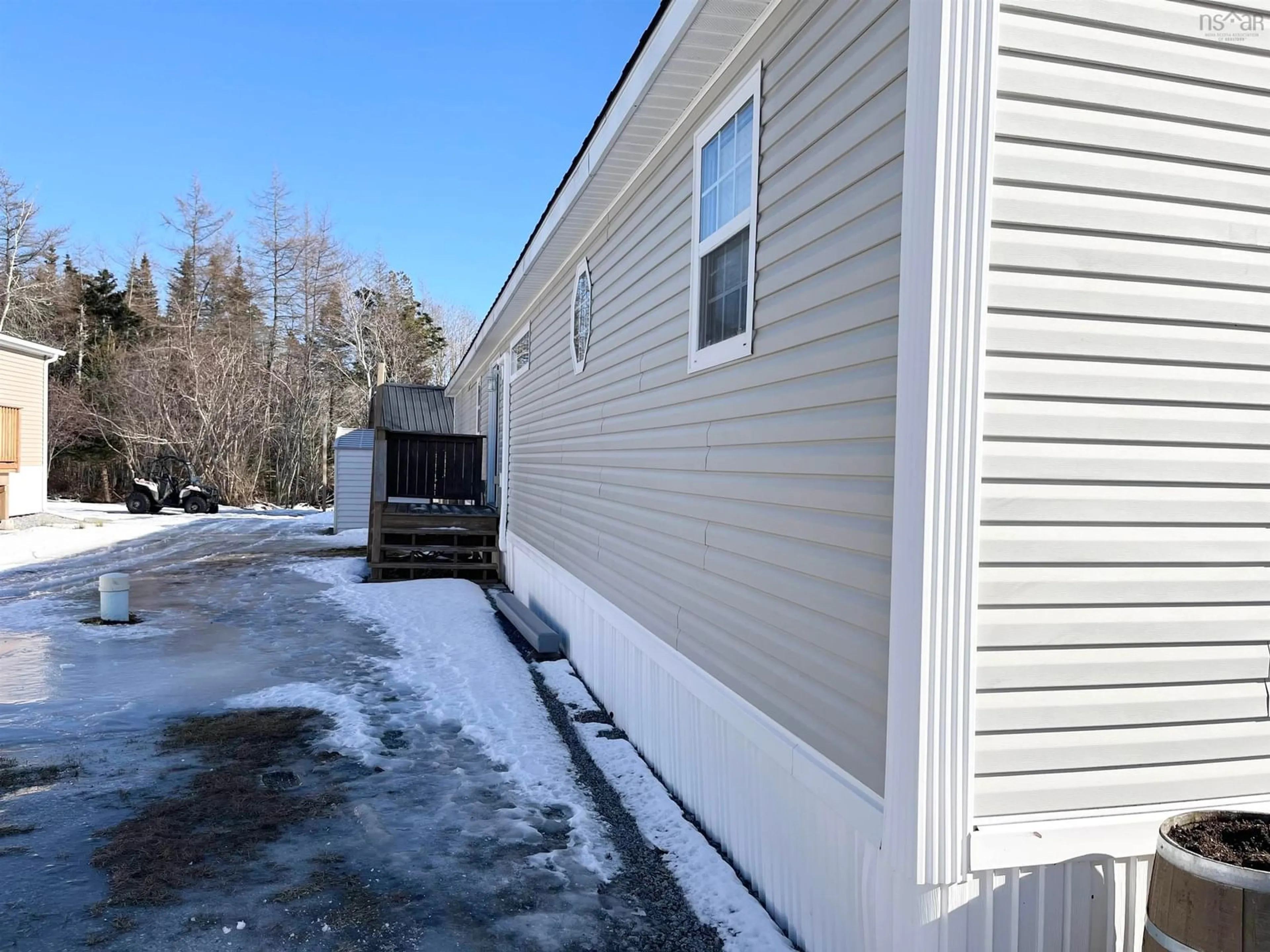 Home with vinyl exterior material, street for 16 Forest View Dr, Barrington Nova Scotia B0W 1E0