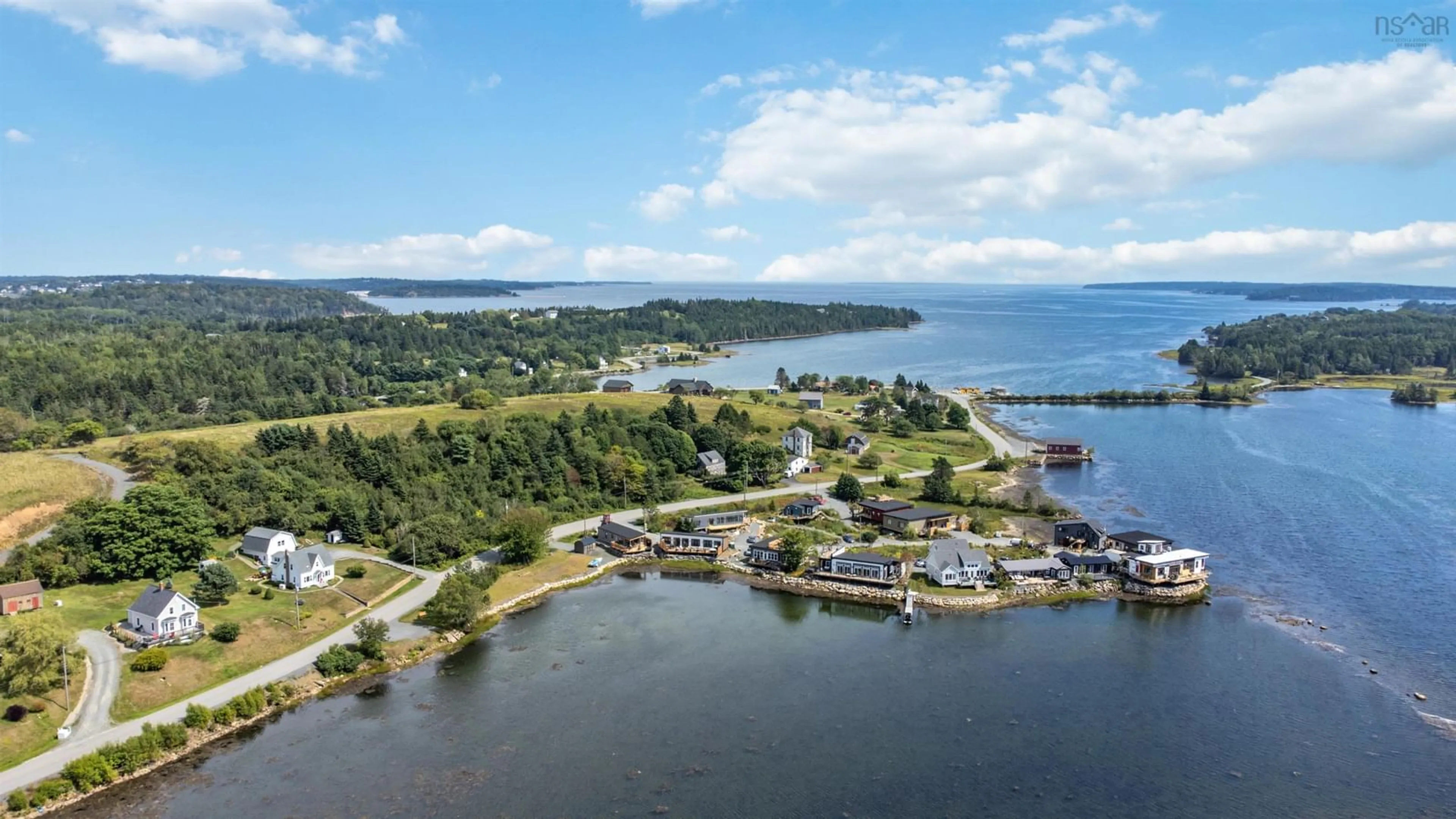 A pic from outside/outdoor area/front of a property/back of a property/a pic from drone, water/lake/river/ocean view for 693 Masons Beach Rd #12, First South Nova Scotia B0J 2C0