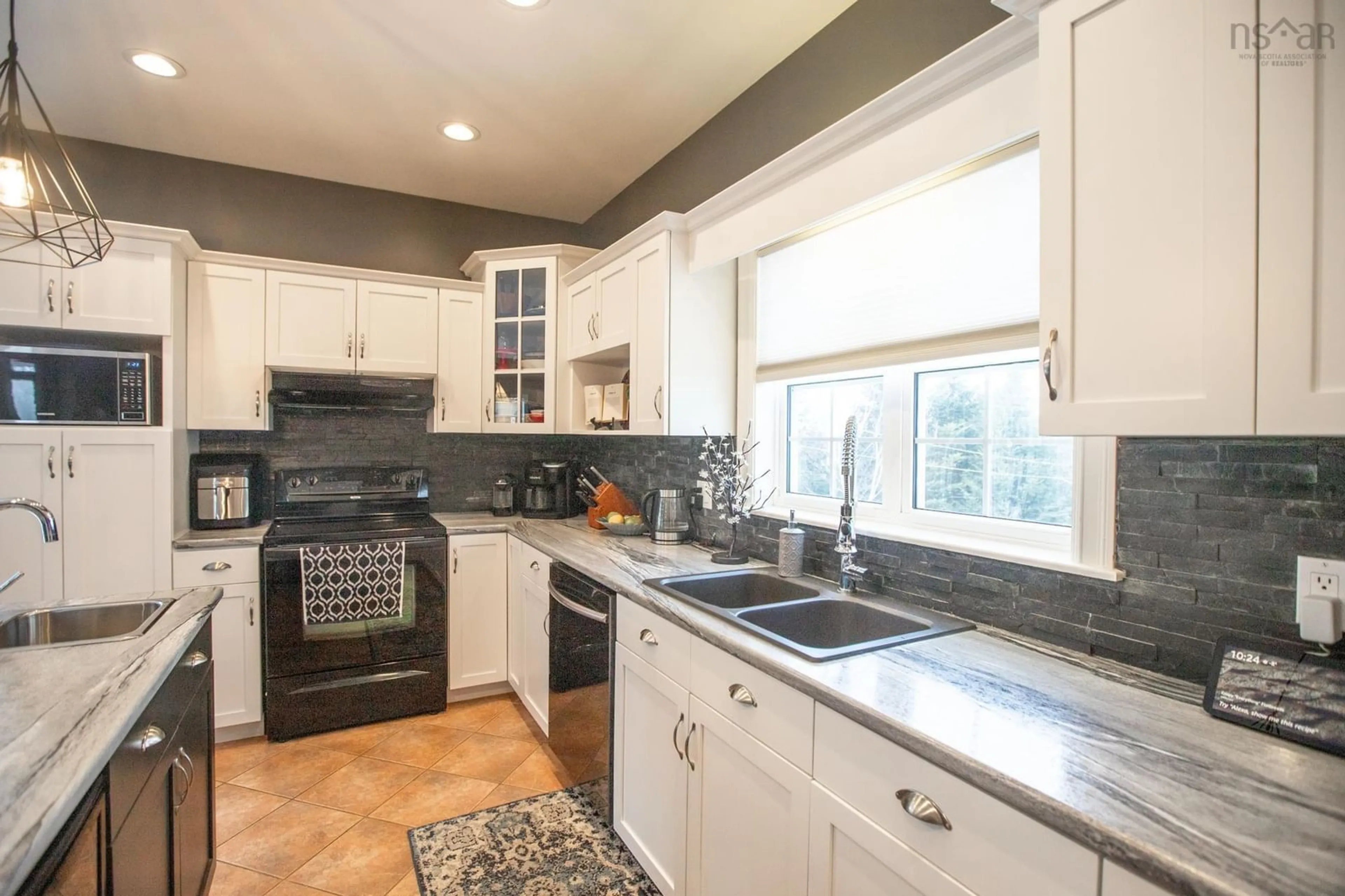 Open concept kitchen, ceramic/tile floor for 27 Summit Cres, Upper Tantallon Nova Scotia B3Z 1P9