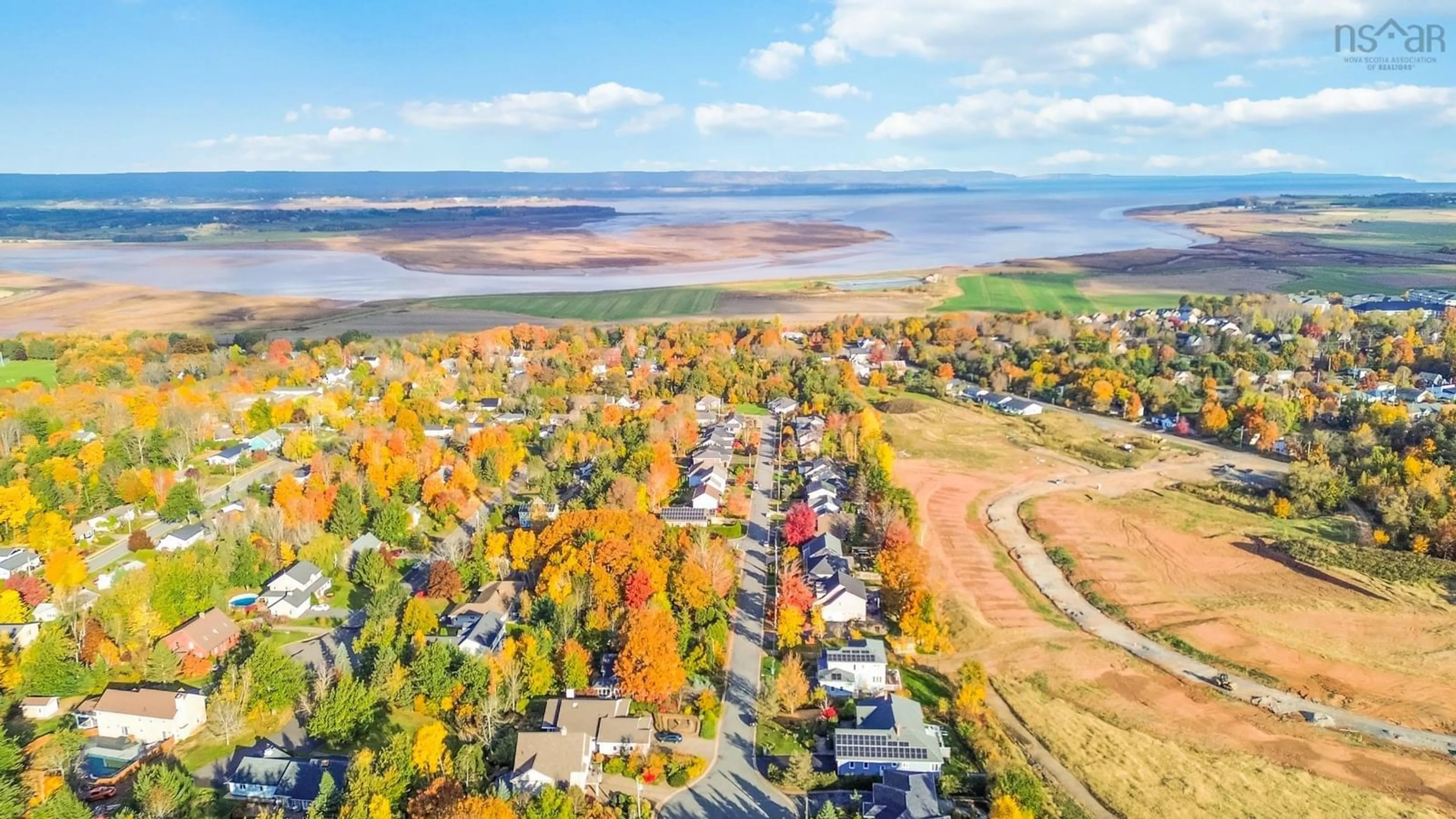 A pic from outside/outdoor area/front of a property/back of a property/a pic from drone, water/lake/river/ocean view for 84 Bishop Ave, Wolfville Nova Scotia B4P 2L5