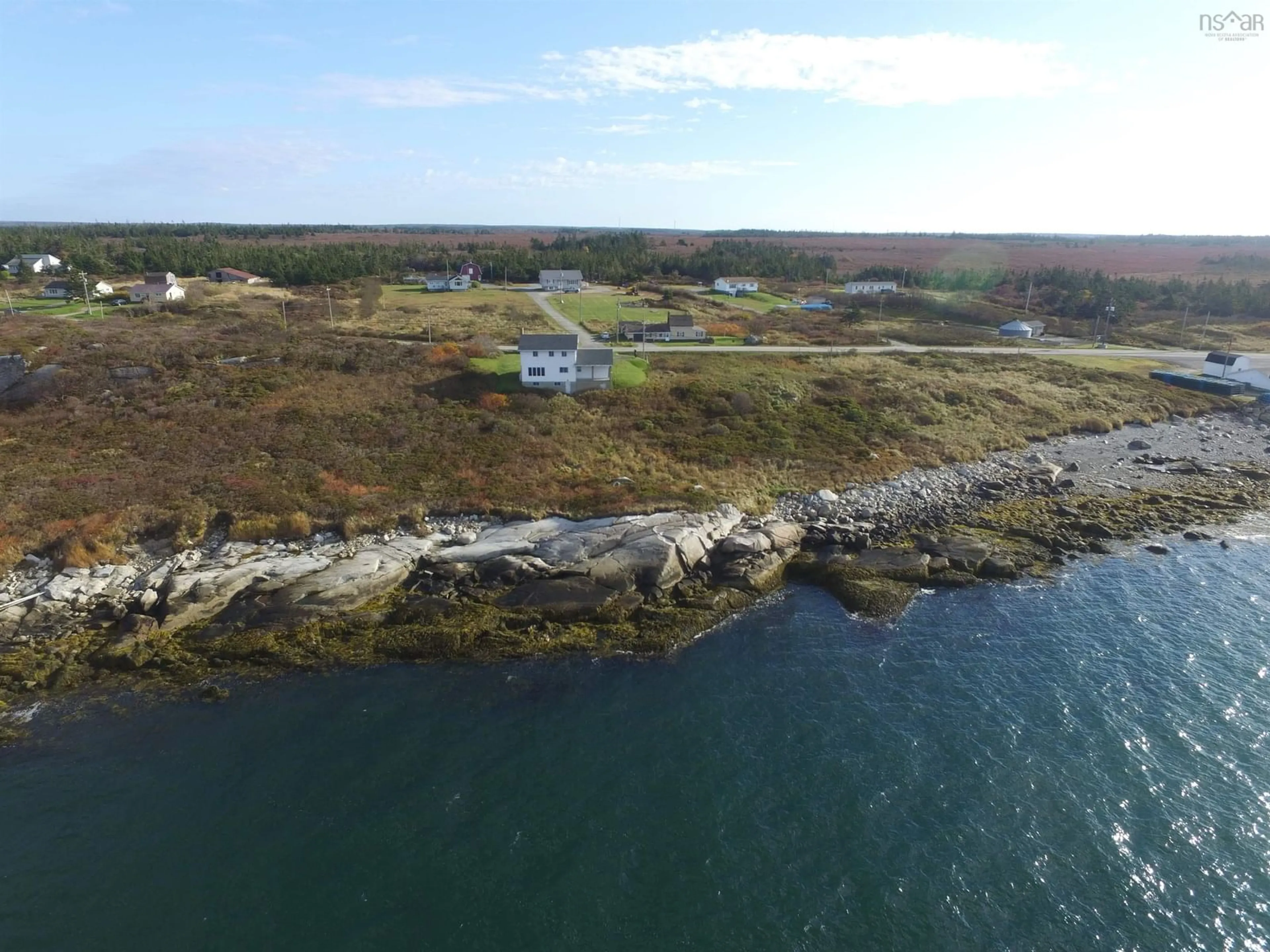 A pic from outside/outdoor area/front of a property/back of a property/a pic from drone, water/lake/river/ocean view for 6175 Highway 3, Lower Woods Harbour Nova Scotia B0W 2E0
