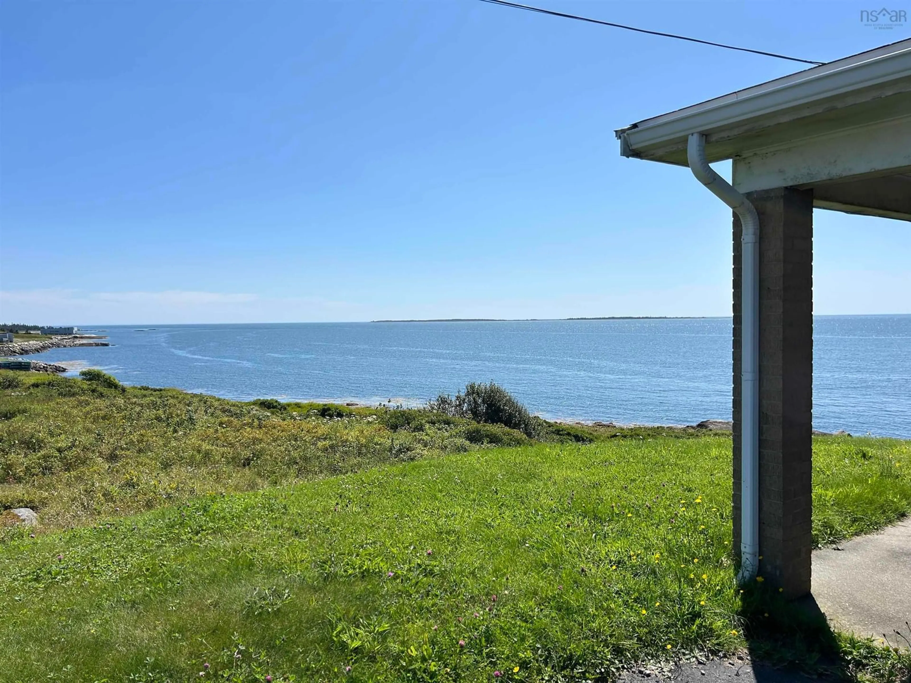 A pic from outside/outdoor area/front of a property/back of a property/a pic from drone, water/lake/river/ocean view for 6175 Highway 3, Lower Woods Harbour Nova Scotia B0W 2E0