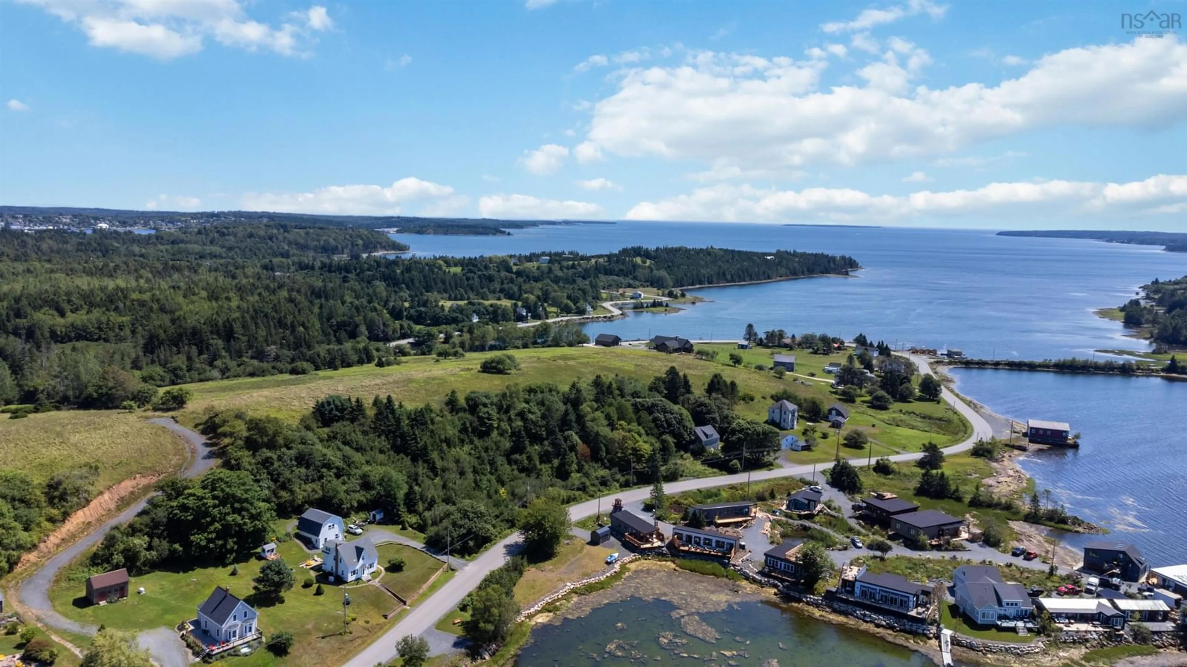 A pic from outside/outdoor area/front of a property/back of a property/a pic from drone, water/lake/river/ocean view for 693 Masons Beach Rd #14, First South Nova Scotia B0J 2C0