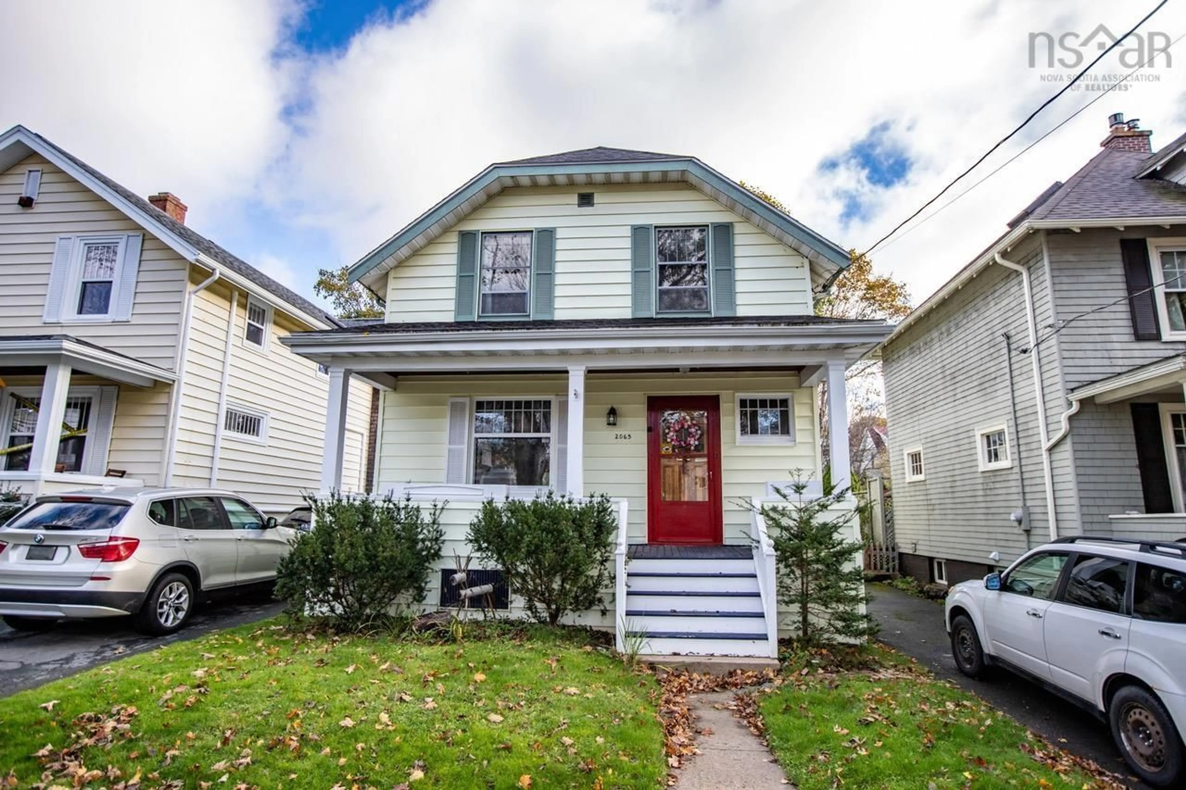 Home with vinyl exterior material, street for 2065 Poplar St, Halifax Nova Scotia B3L 2Y6