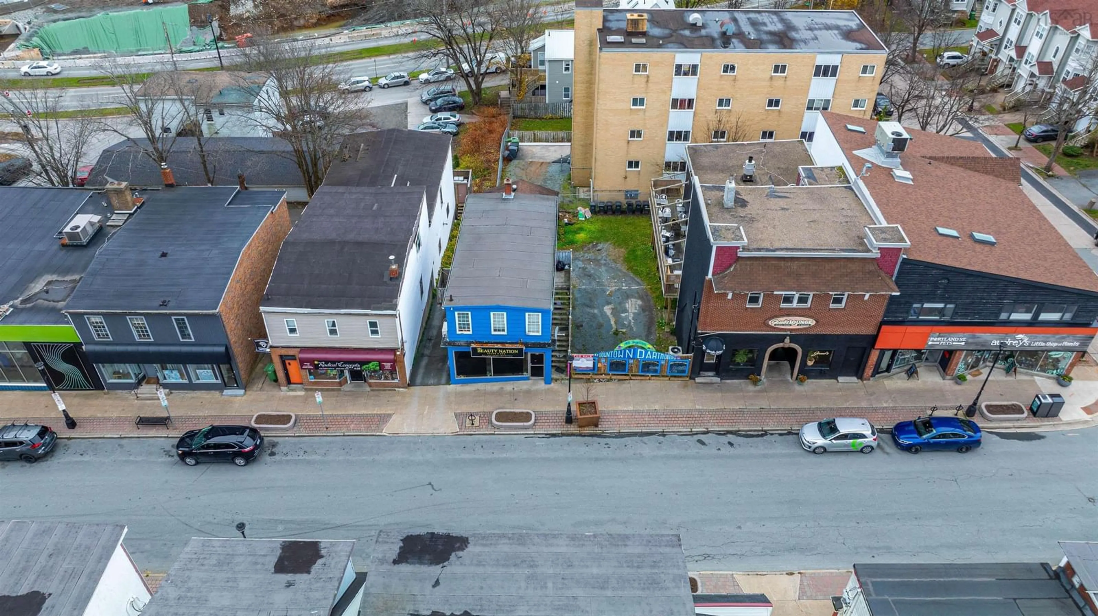 A pic from outside/outdoor area/front of a property/back of a property/a pic from drone, city buildings view from balcony for 110-112 Portland St, Dartmouth Nova Scotia B2Y 1H8