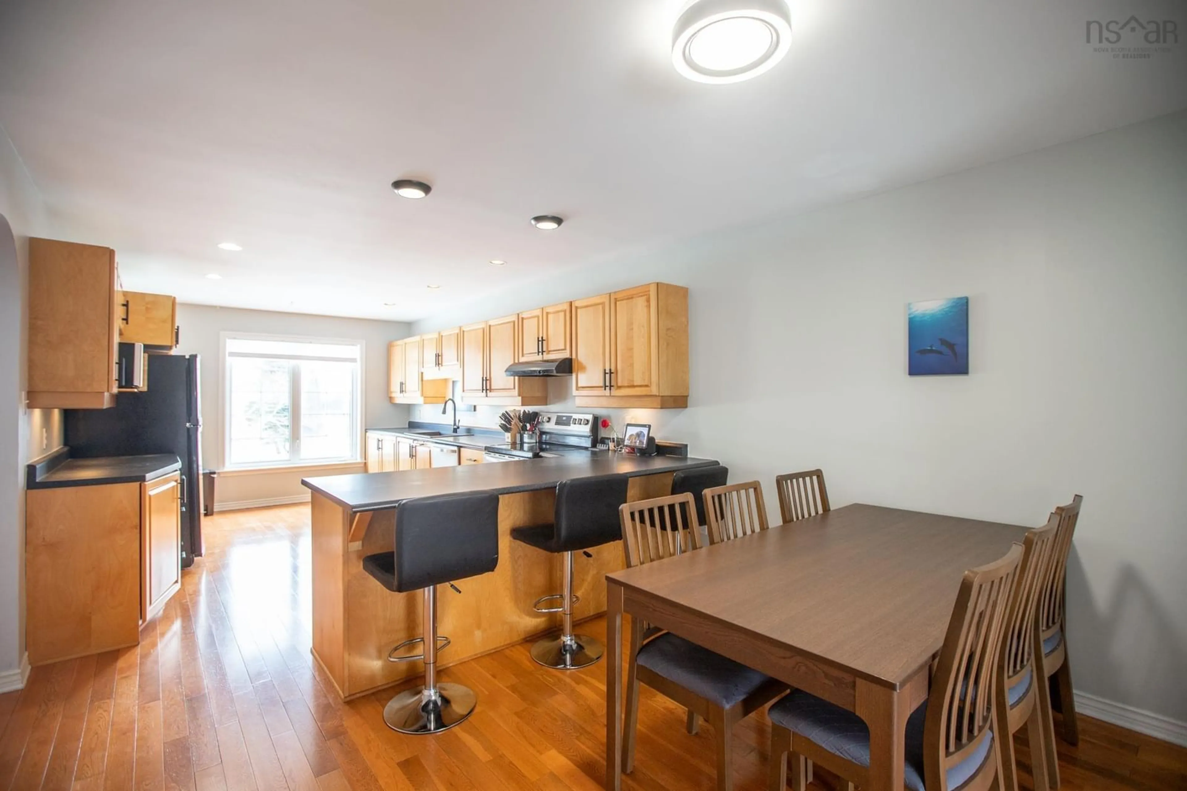 Open concept kitchen, wood/laminate floor for 47 Blue Thistle Road, Clayton Park Nova Scotia B3S 1M3