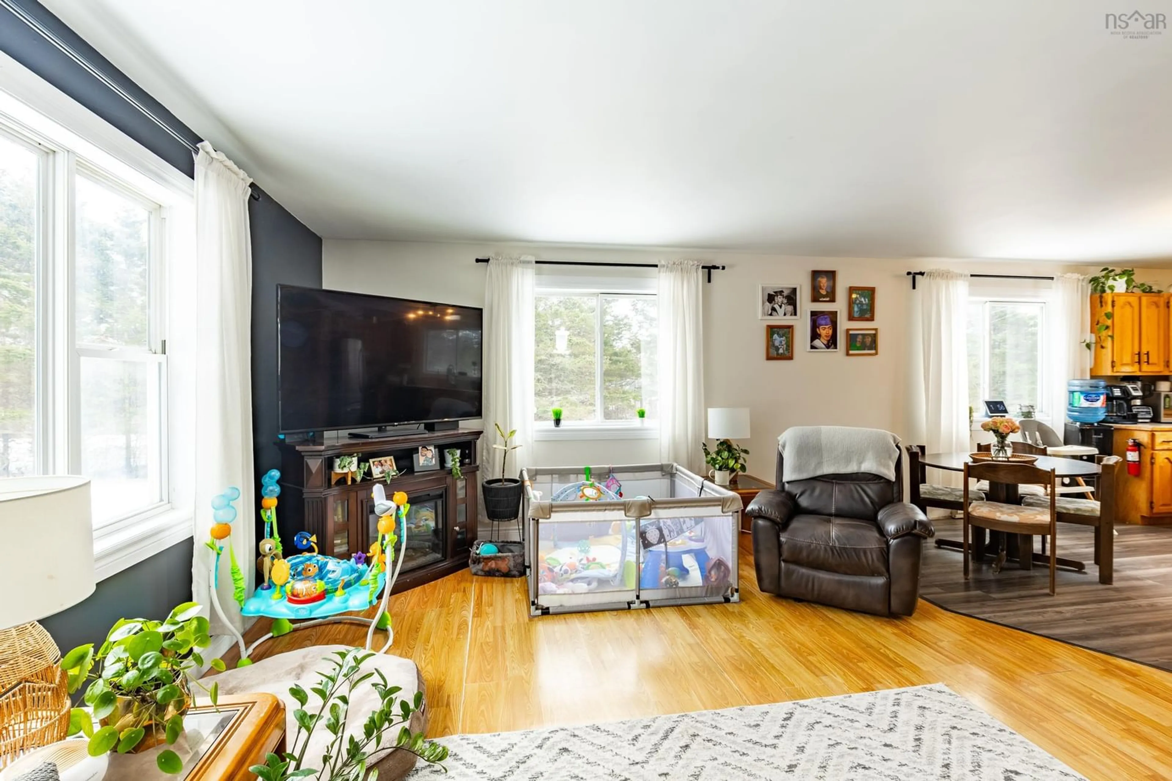 Living room with furniture, wood/laminate floor for 49 Green Rock Dr, South Chegoggin Nova Scotia B5A 5H1