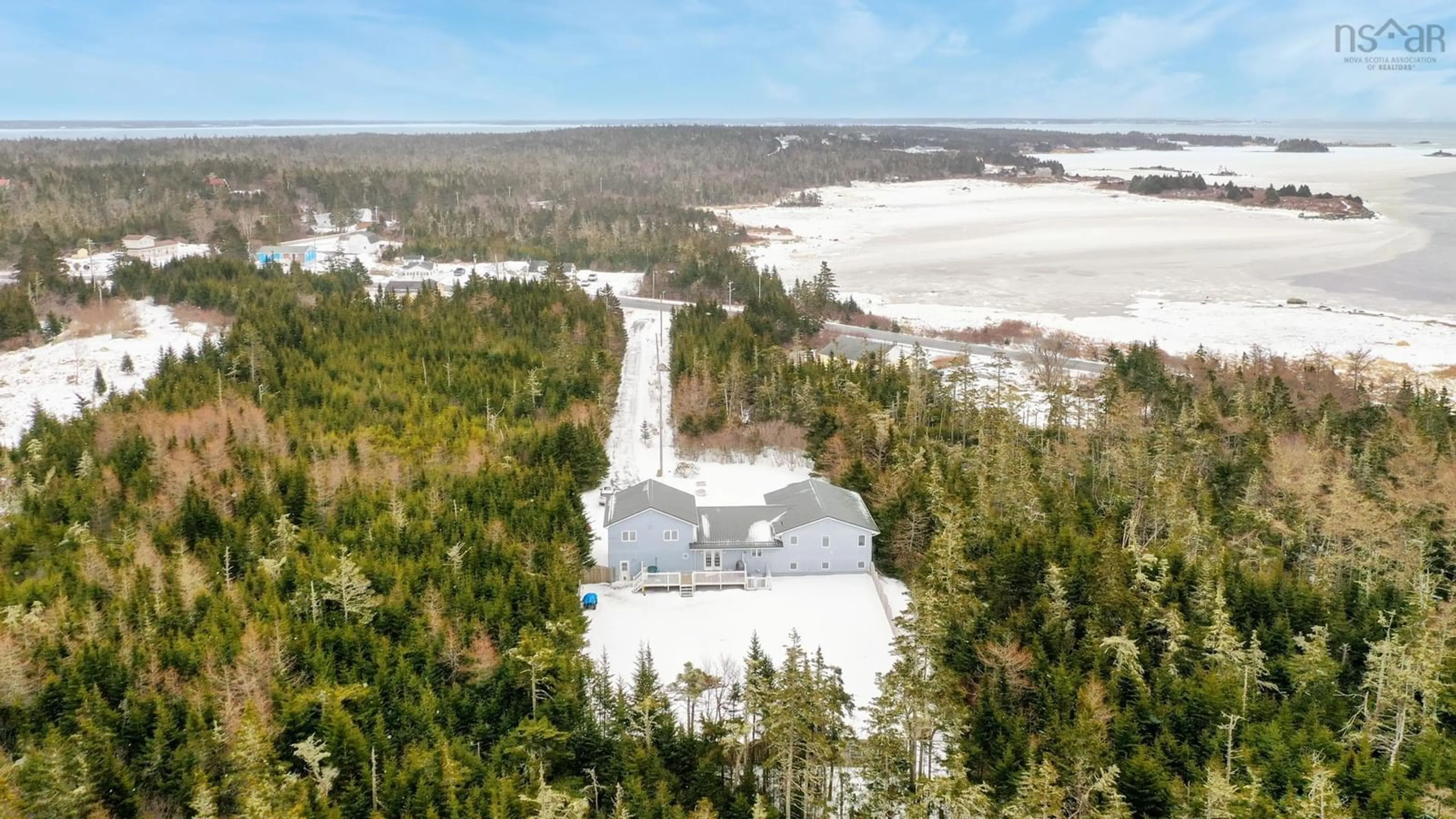 A pic from outside/outdoor area/front of a property/back of a property/a pic from drone, unknown for 5032 Highway 3, Shag Harbour Nova Scotia B0W 3B0