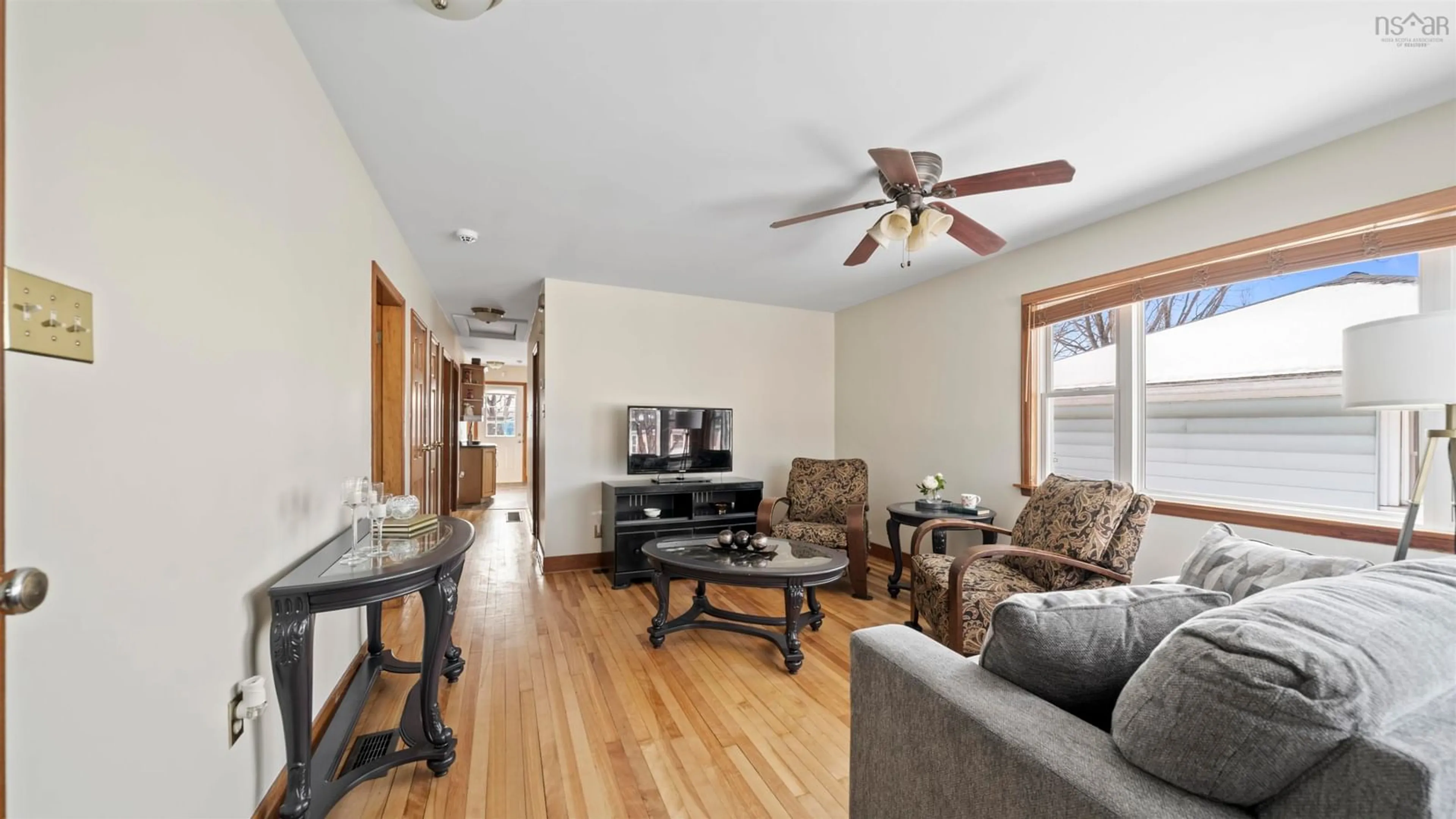 Living room with furniture, wood/laminate floor for 98 Russell St, Dartmouth Nova Scotia B3A 3N5