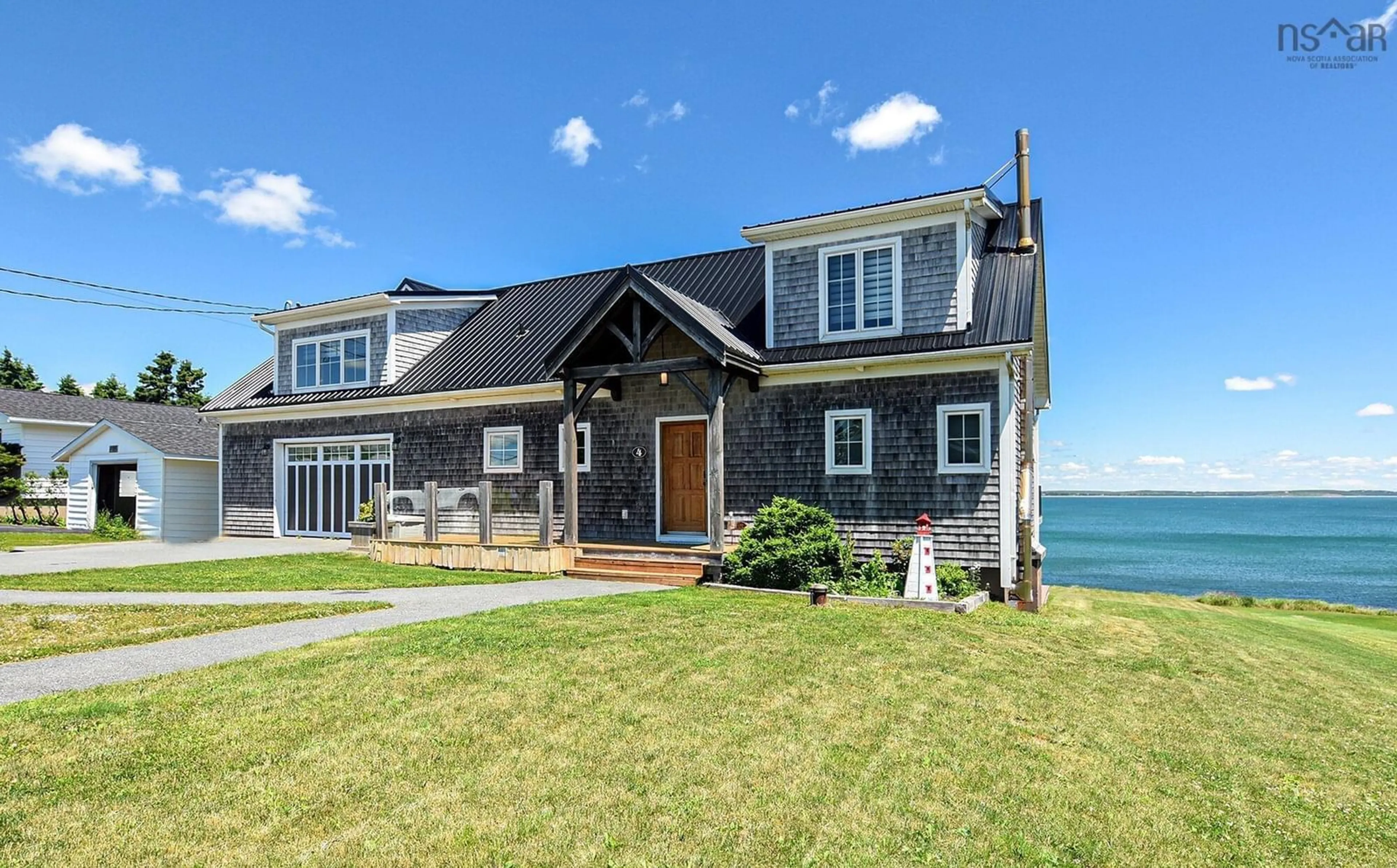 Home with vinyl exterior material, water/lake/river/ocean view for 4 Lintaman Lane, Cow Bay Nova Scotia B3G 1L3