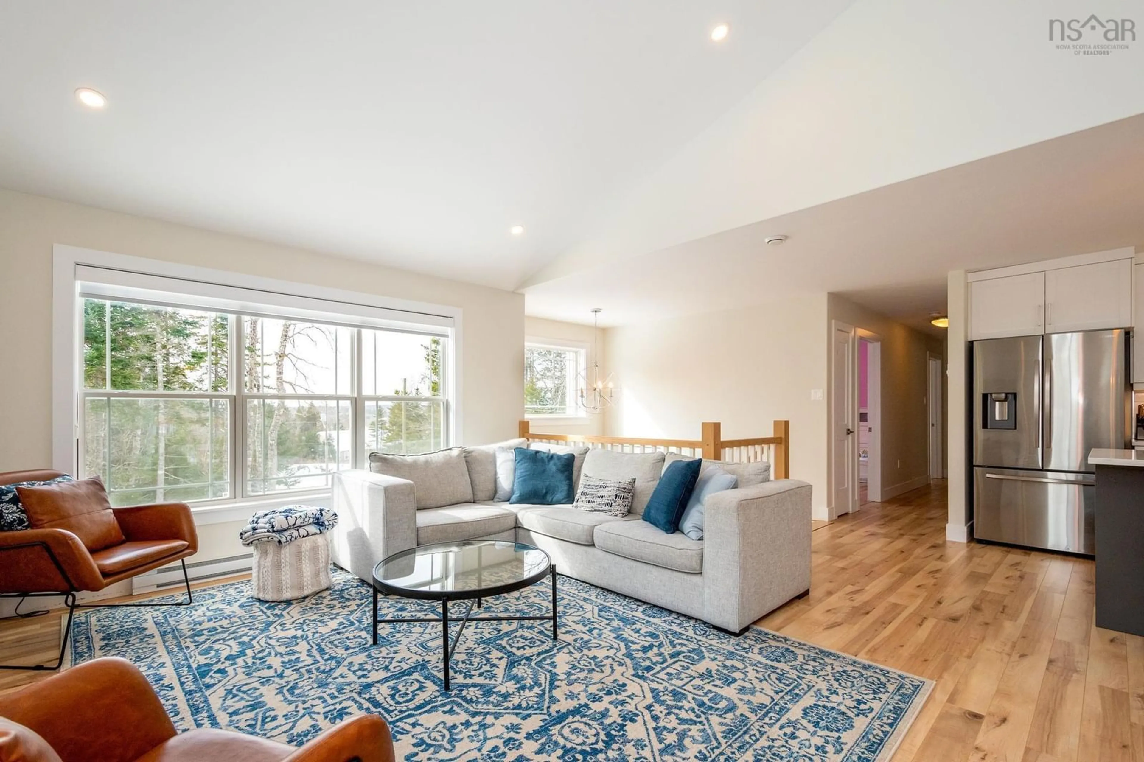 Living room with furniture, wood/laminate floor for 627 Magenta Dr, Middle Sackville Nova Scotia B4E 0M7