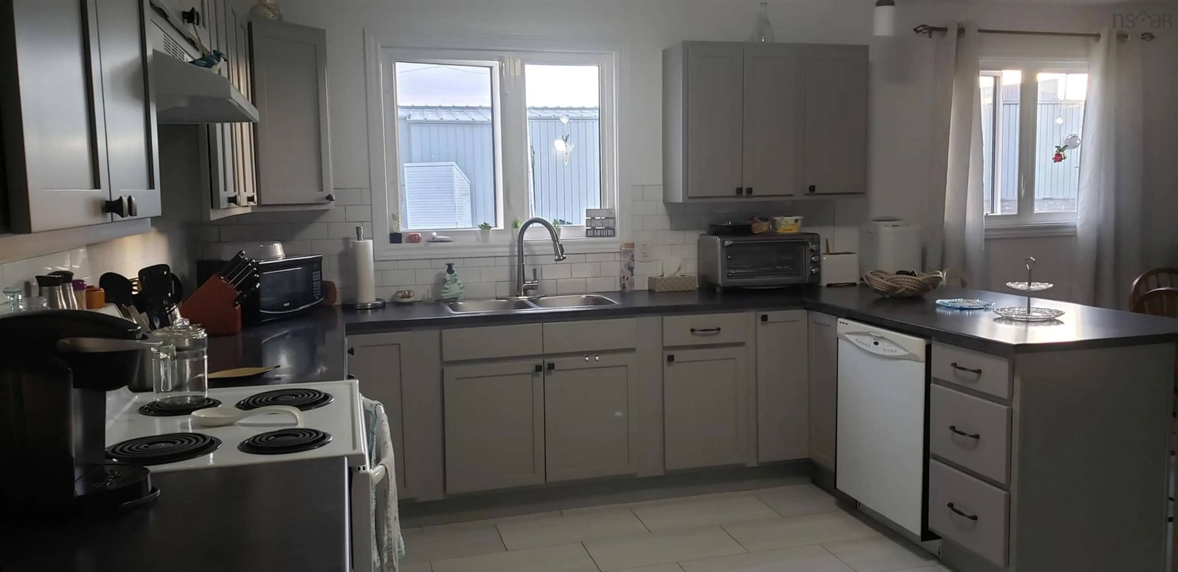 Standard kitchen, ceramic/tile floor for 11 Toulouse St, St. Peter's Nova Scotia B0E 3B0