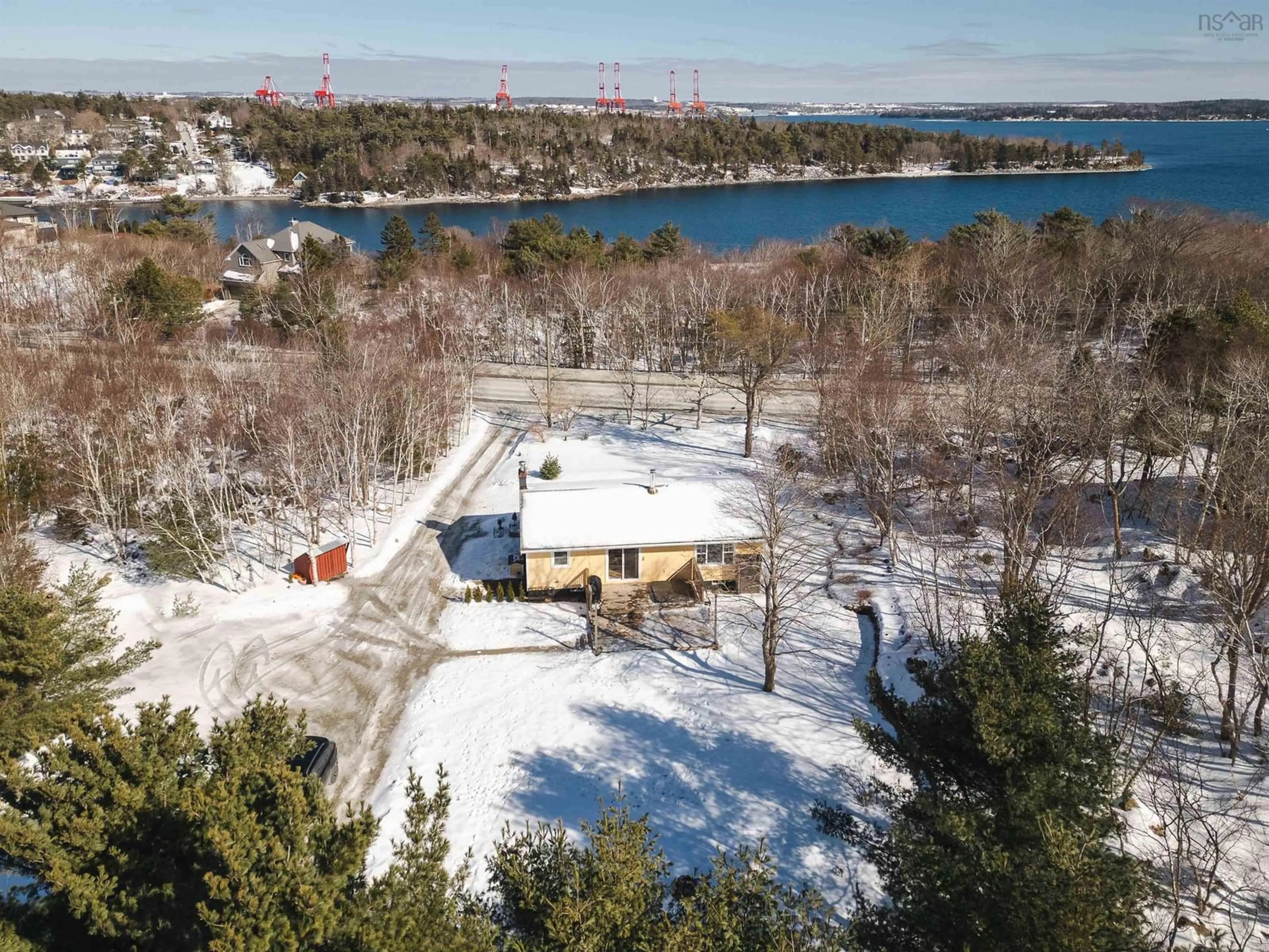 A pic from outside/outdoor area/front of a property/back of a property/a pic from drone, water/lake/river/ocean view for 2565 Purcells Cove Rd, Halifax Nova Scotia B3P 2E7