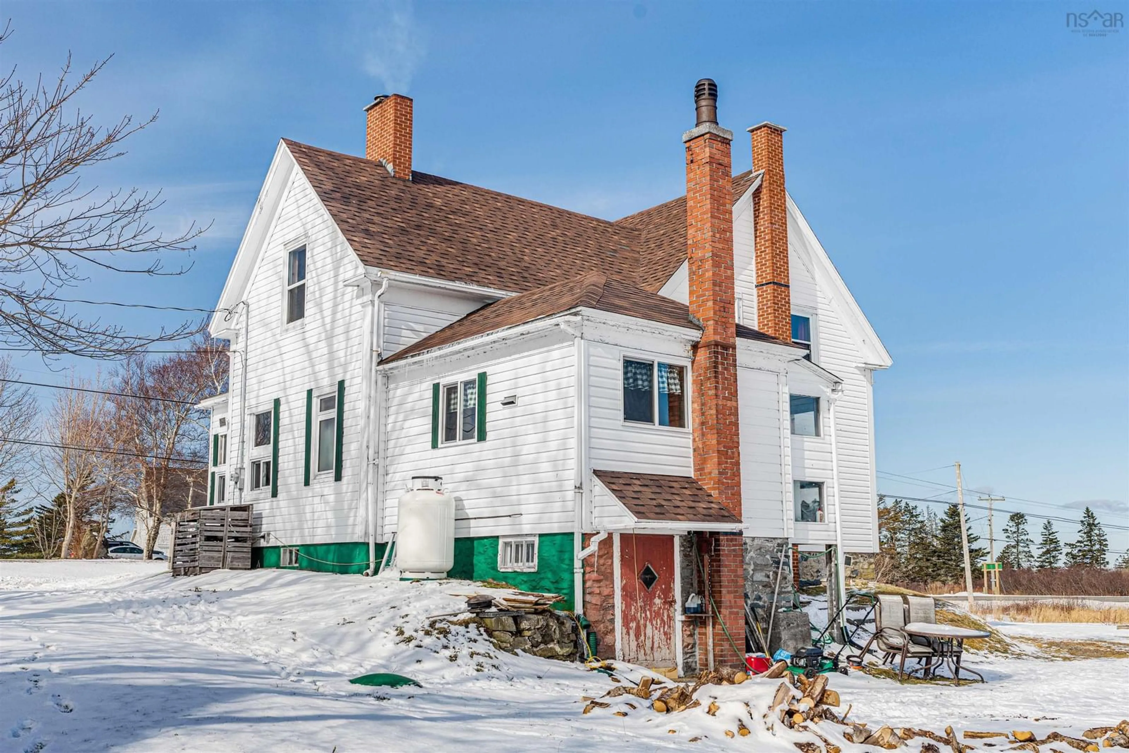 Home with brick exterior material, street for 2302 Highway 1, Grosses Coques Nova Scotia B0W 1M0