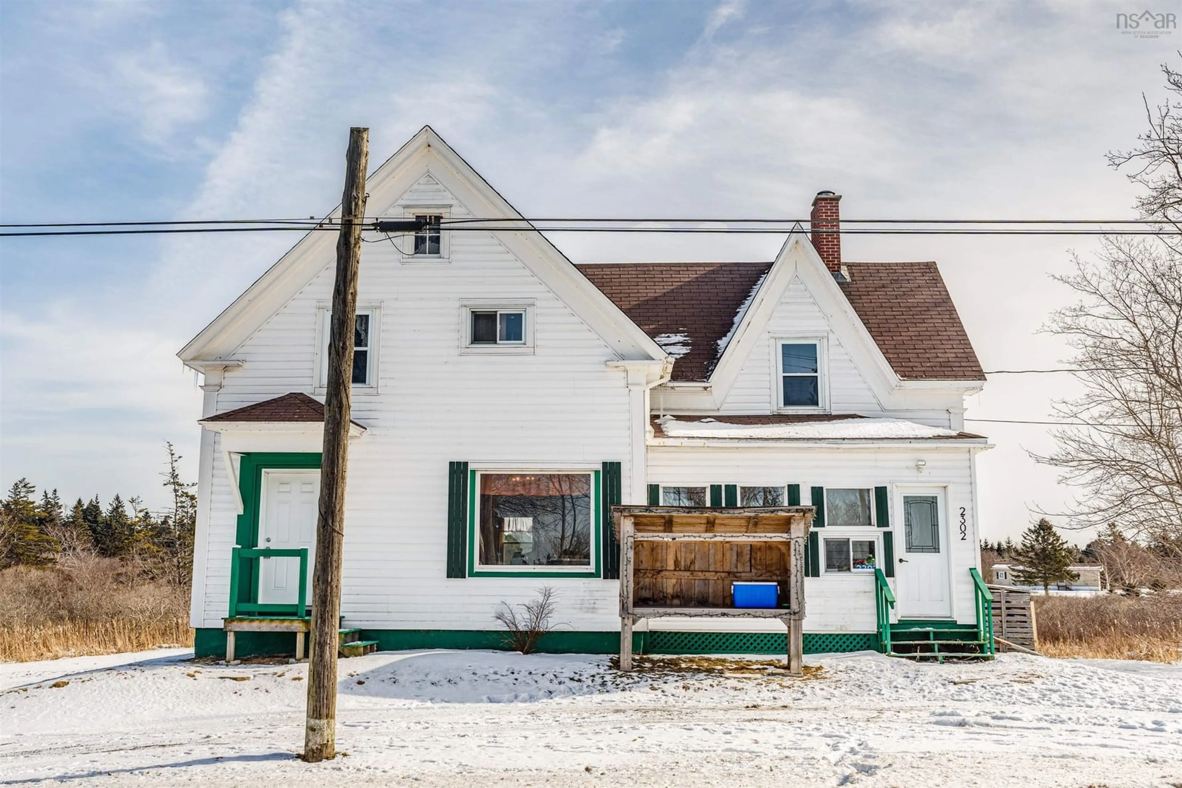 A pic from outside/outdoor area/front of a property/back of a property/a pic from drone, street for 2302 Highway 1, Grosses Coques Nova Scotia B0W 1M0