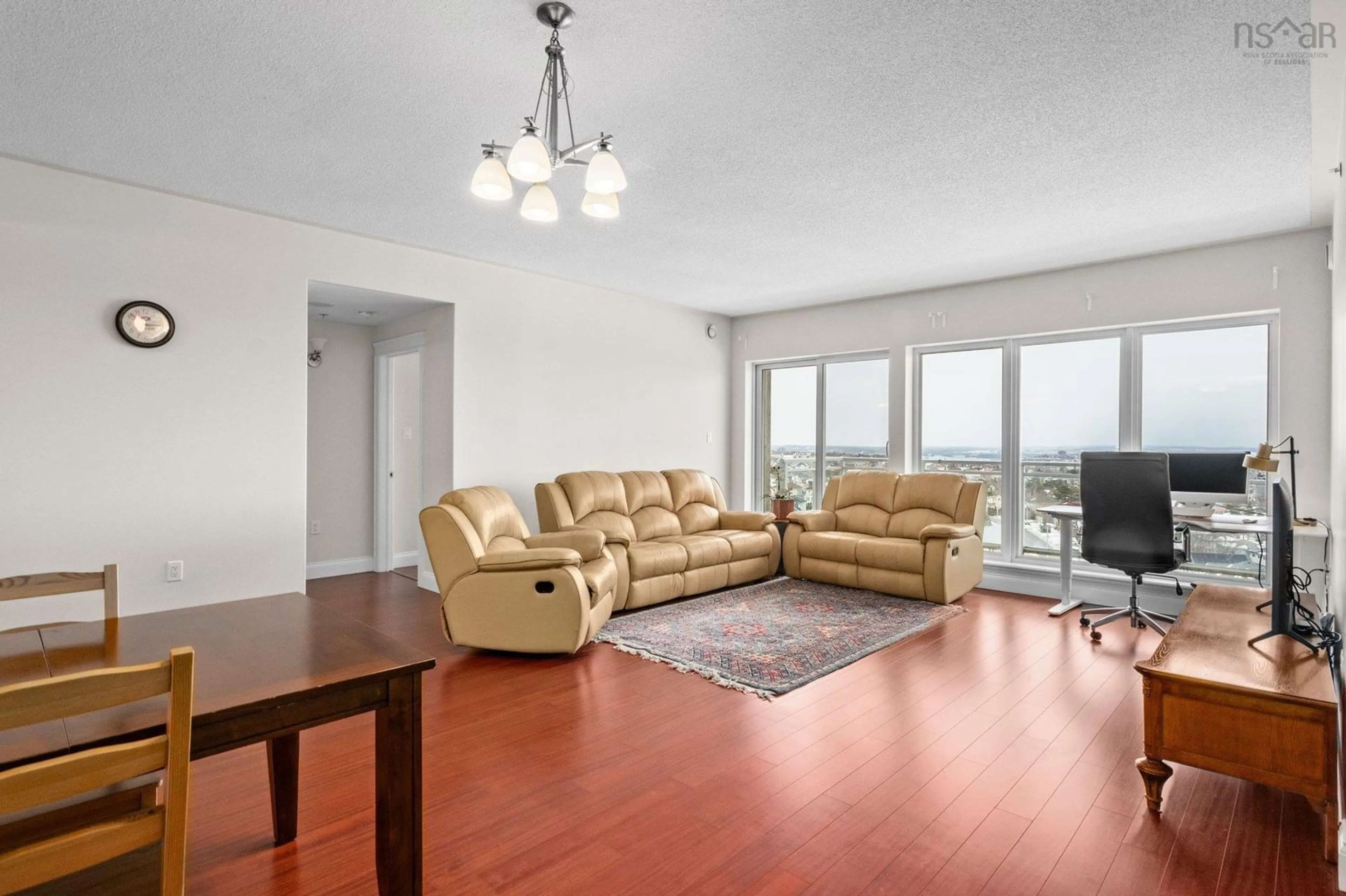 Living room with furniture, wood/laminate floor for 60 Walter Havill Drive #1012, Halifax Nova Scotia B3N 0A9