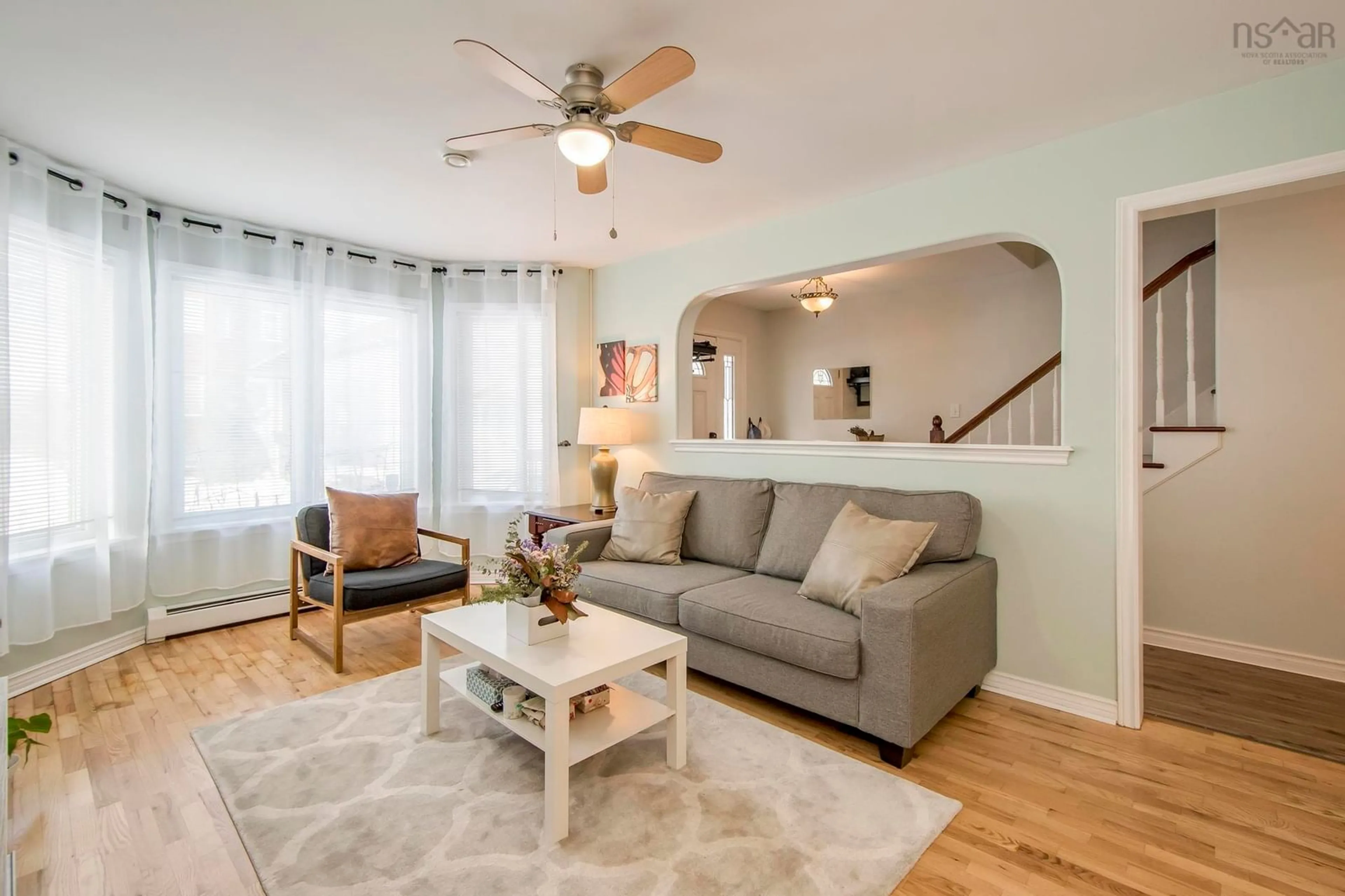 Living room with furniture, wood/laminate floor for 26 James Winfield Lane, Bedford South Nova Scotia B4A 4C3