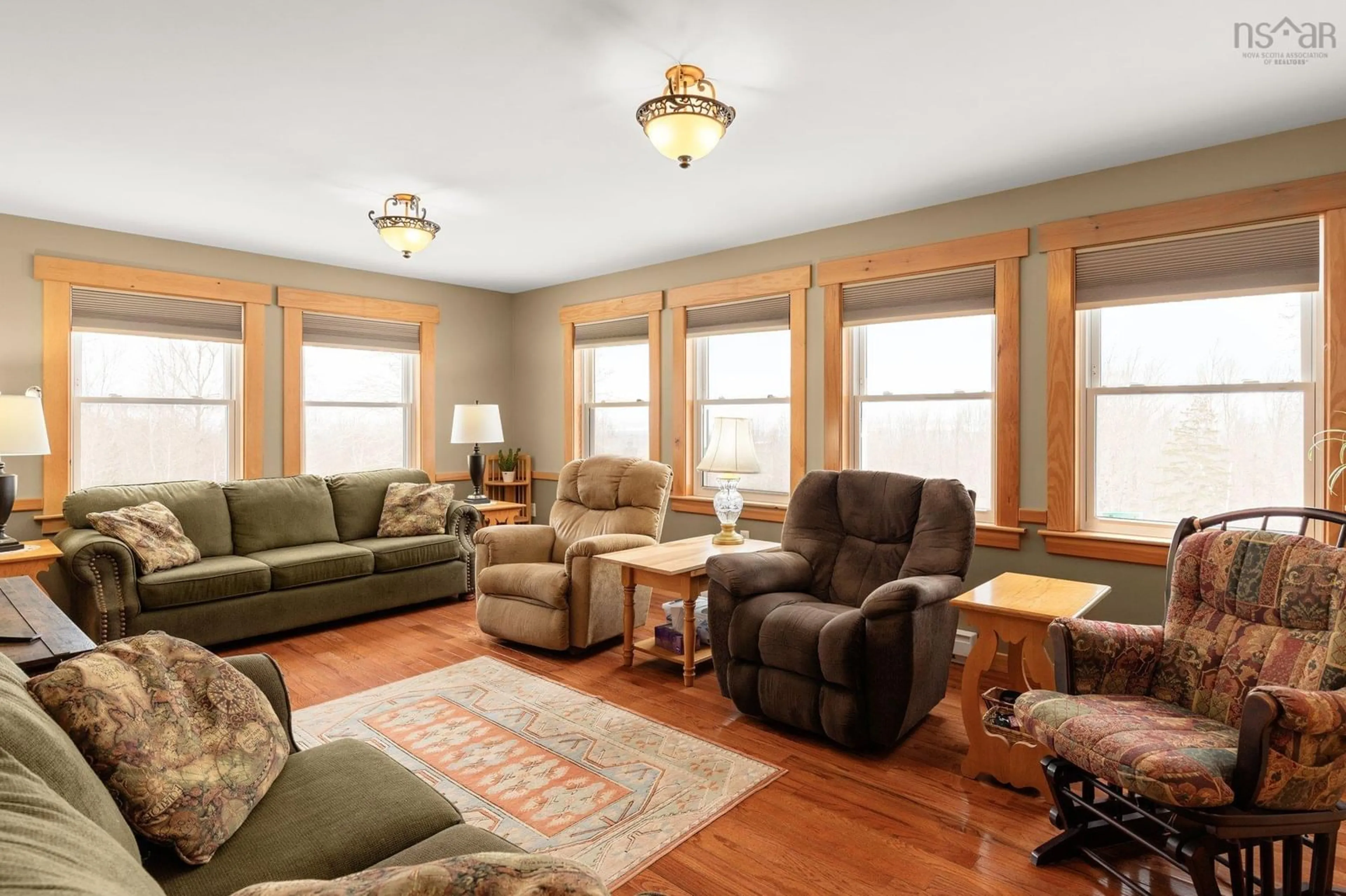 Living room with furniture, wood/laminate floor for 327 East Torbrook Rd, Torbrook Nova Scotia B0P 1W0