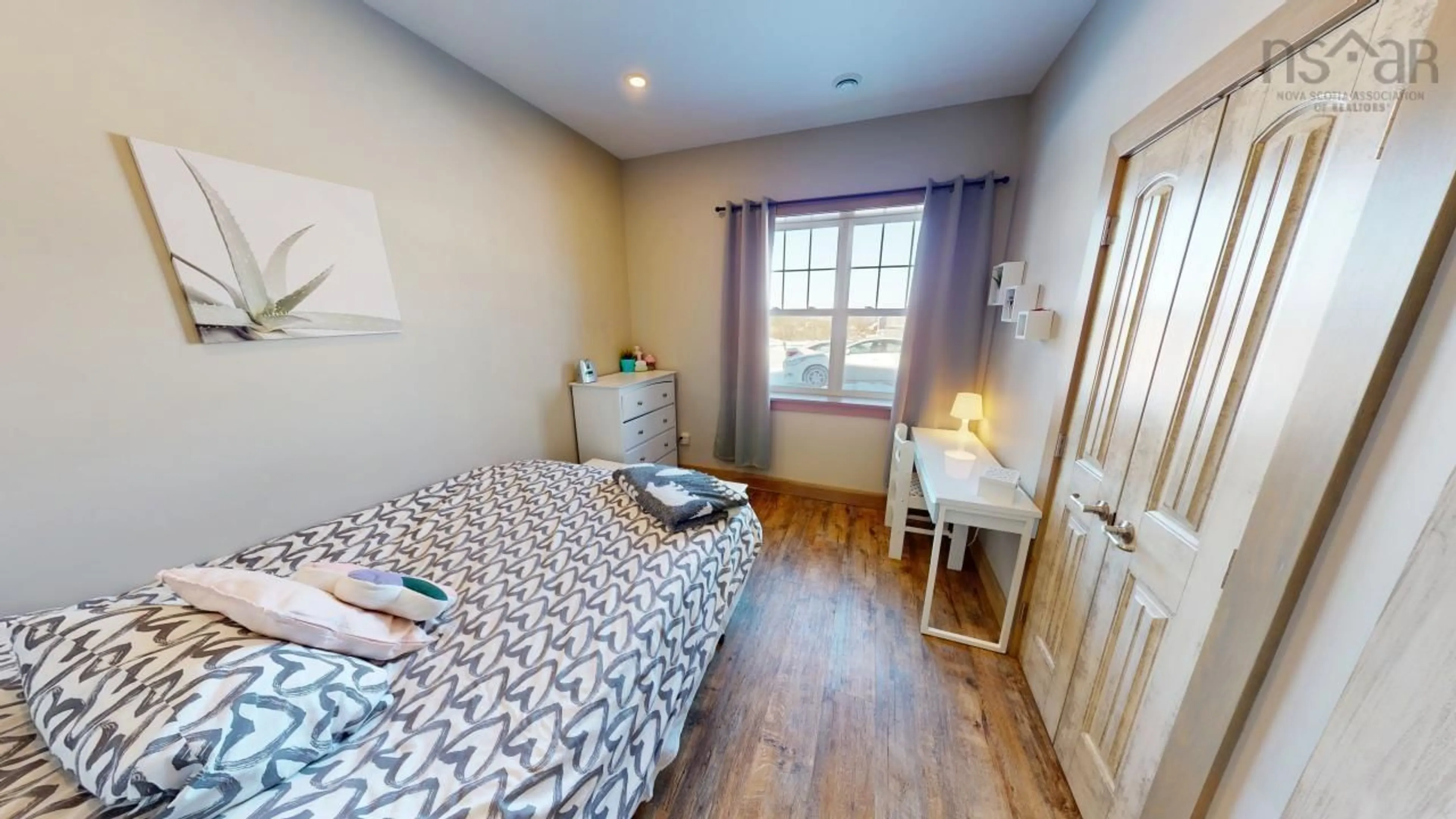 Bedroom with bed, wood/laminate floor for 205 Norma St, New Glasgow Nova Scotia B2H 3N5