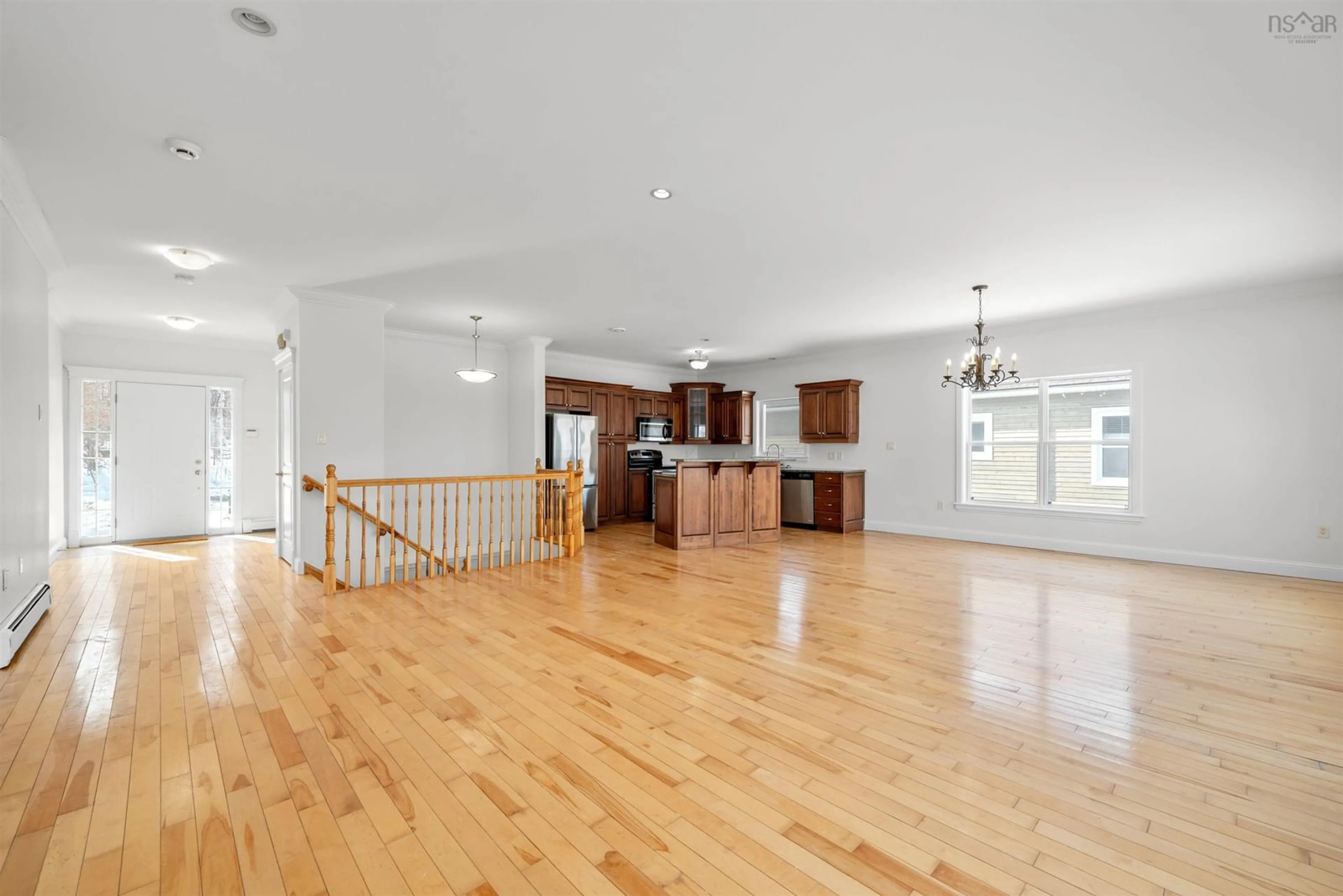 Open concept kitchen, wood/laminate floor for 65 Carnoustie Drive, Hammonds Plains Nova Scotia B4B 0E5