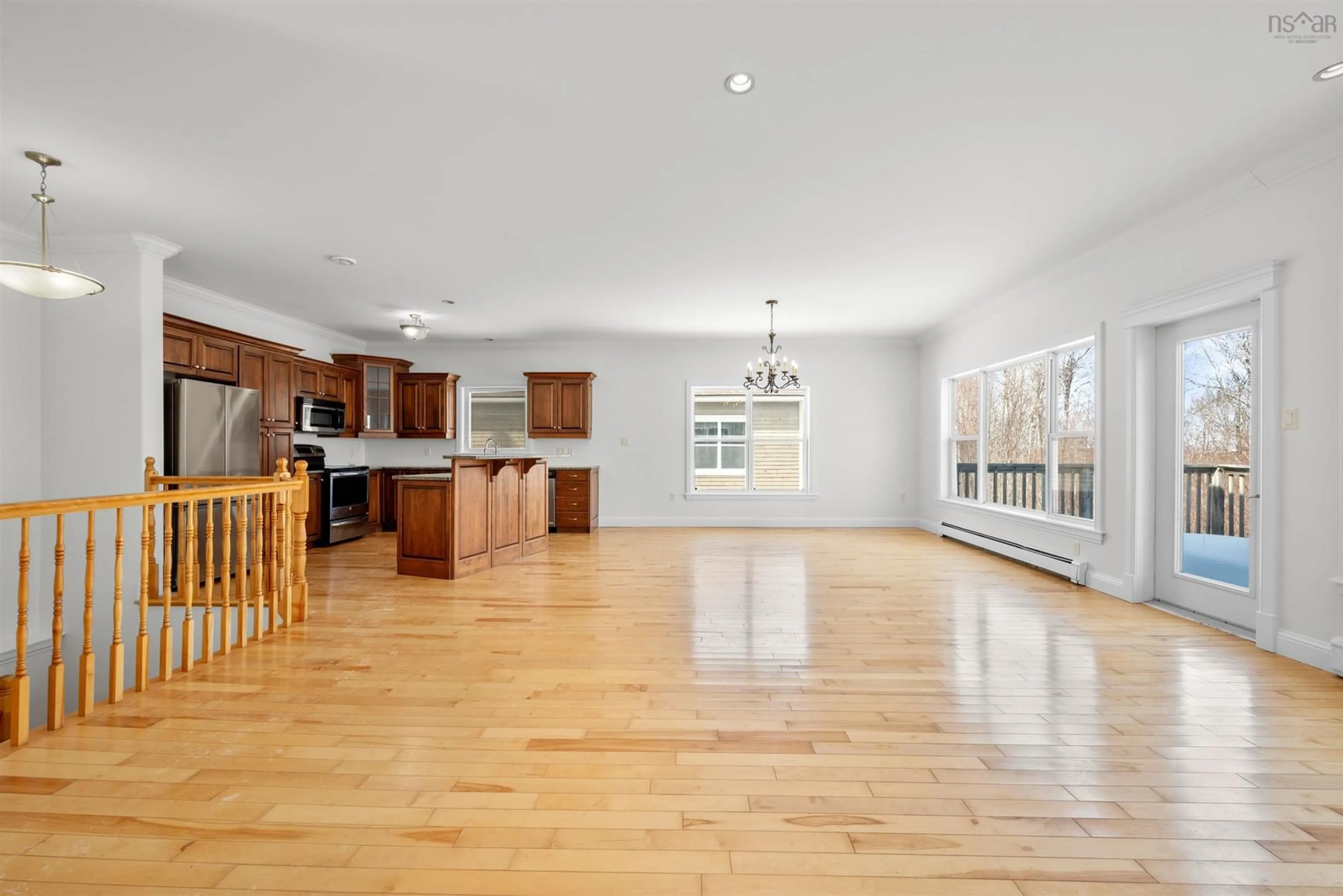 Open concept kitchen, wood/laminate floor for 65 Carnoustie Drive, Hammonds Plains Nova Scotia B4B 0E5