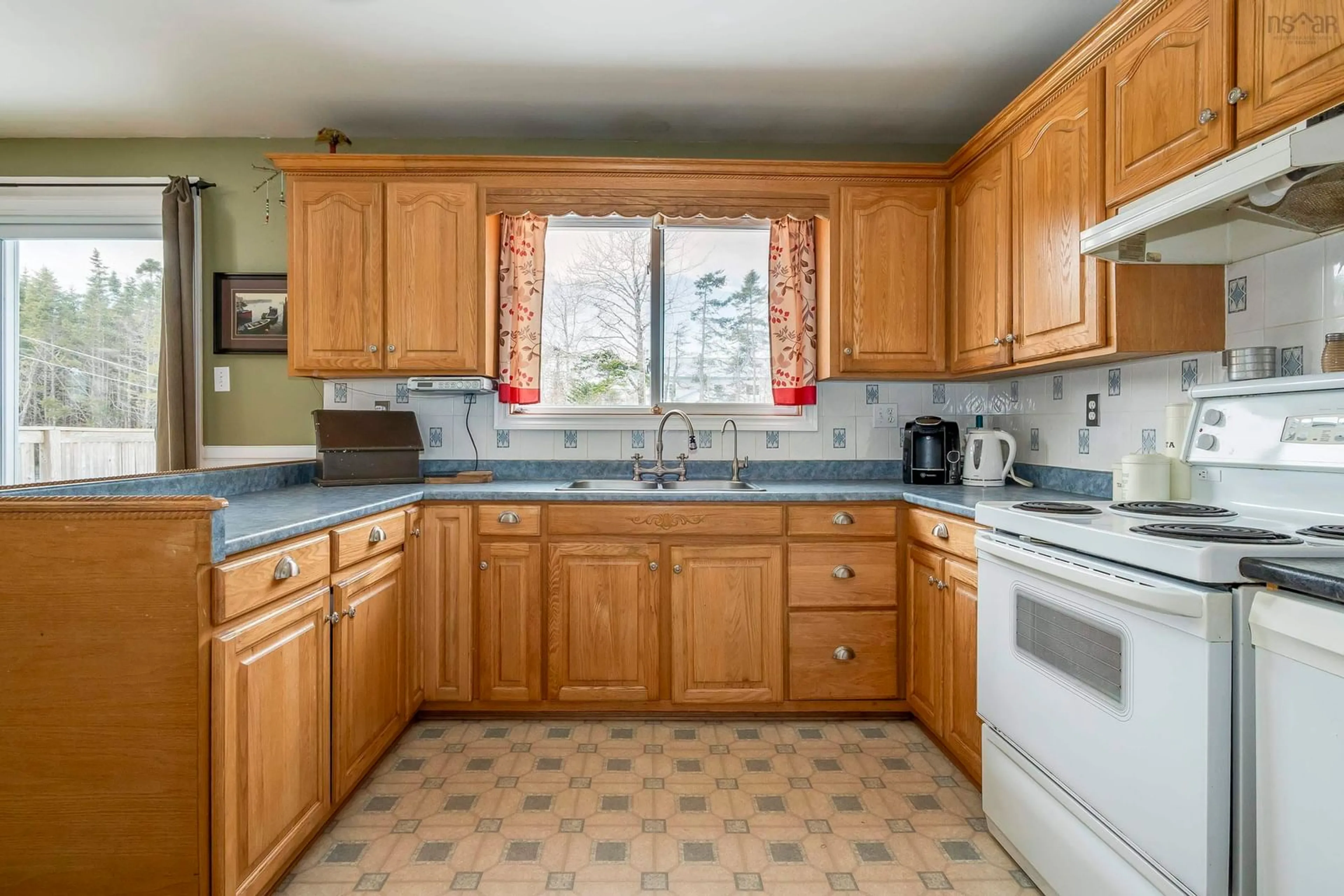 Standard kitchen, ceramic/tile floor for 1777 Crowell Rd, East Lawrencetown Nova Scotia B2Z 1N7