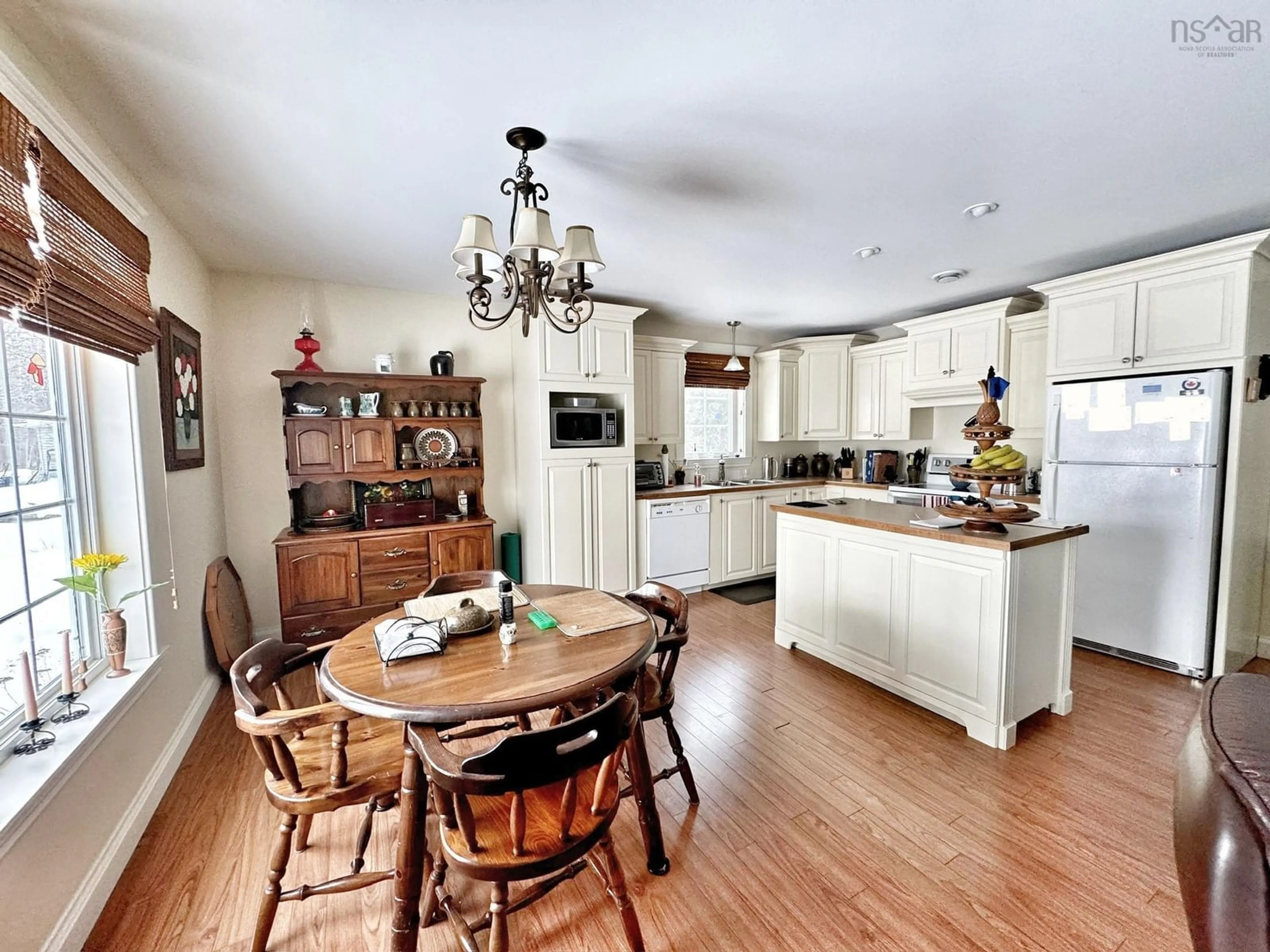 Open concept kitchen, wood/laminate floor for 100 Pleasant St #A&B, Berwick Nova Scotia B0P 1E0