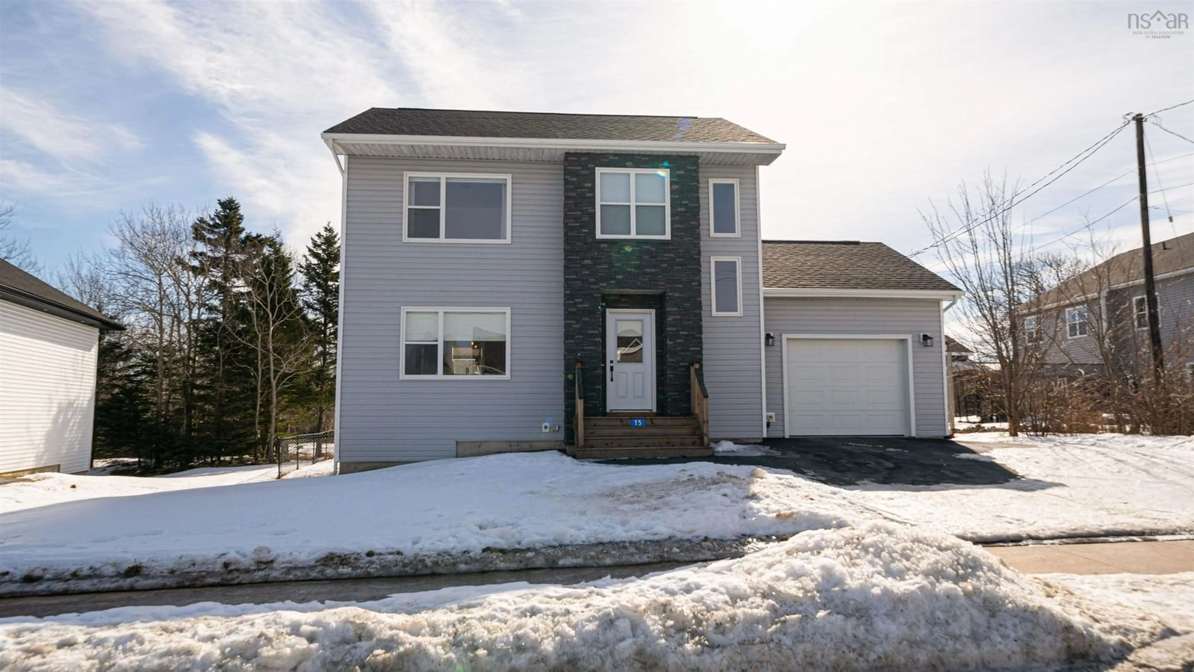 Home with vinyl exterior material, street for 15 Norawarren Dr, Herring Cove Nova Scotia B3R 0B9