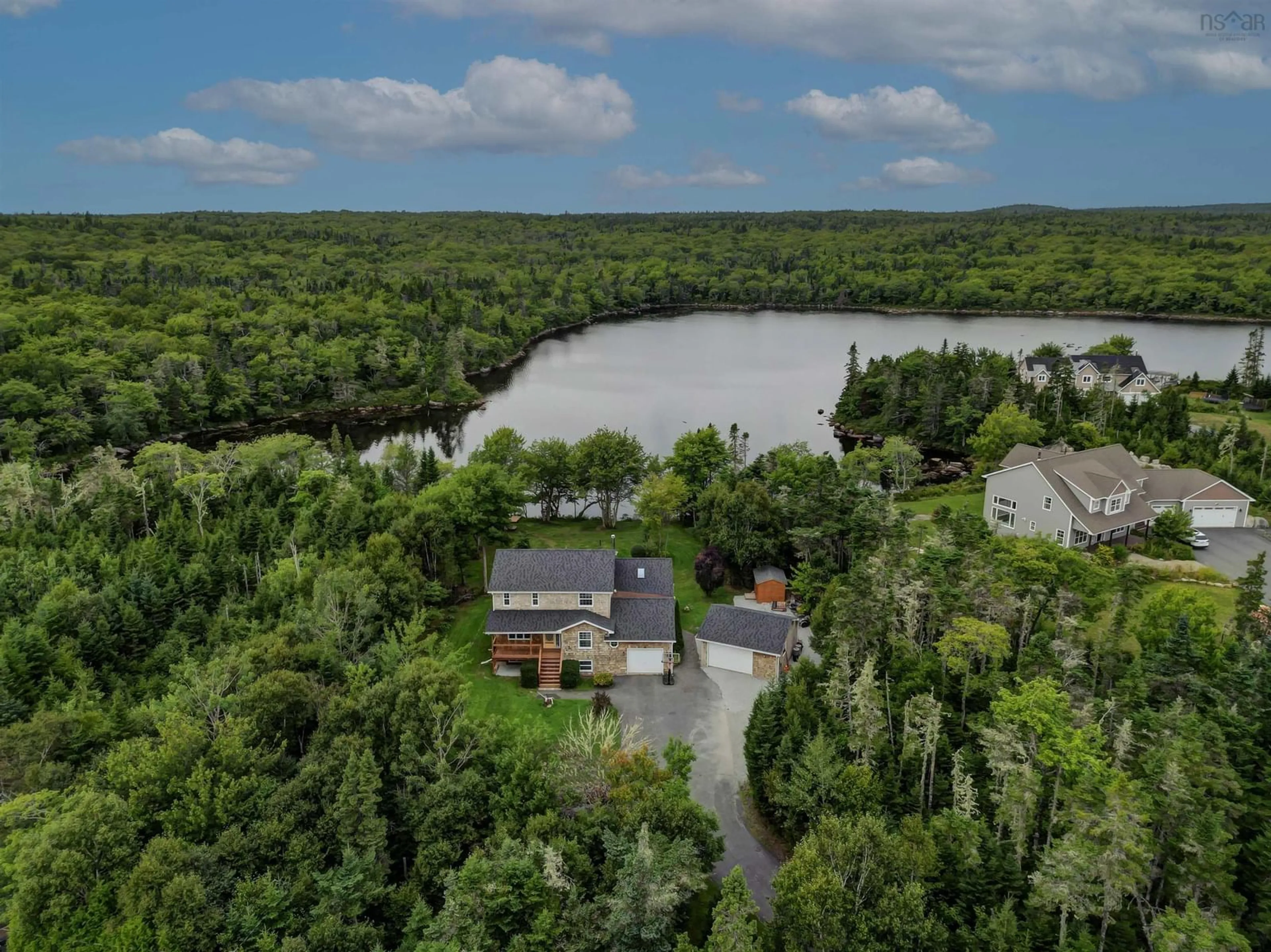 A pic from outside/outdoor area/front of a property/back of a property/a pic from drone, water/lake/river/ocean view for 35 Prospect River Crt, Hatchet Lake Nova Scotia B3T 1R8