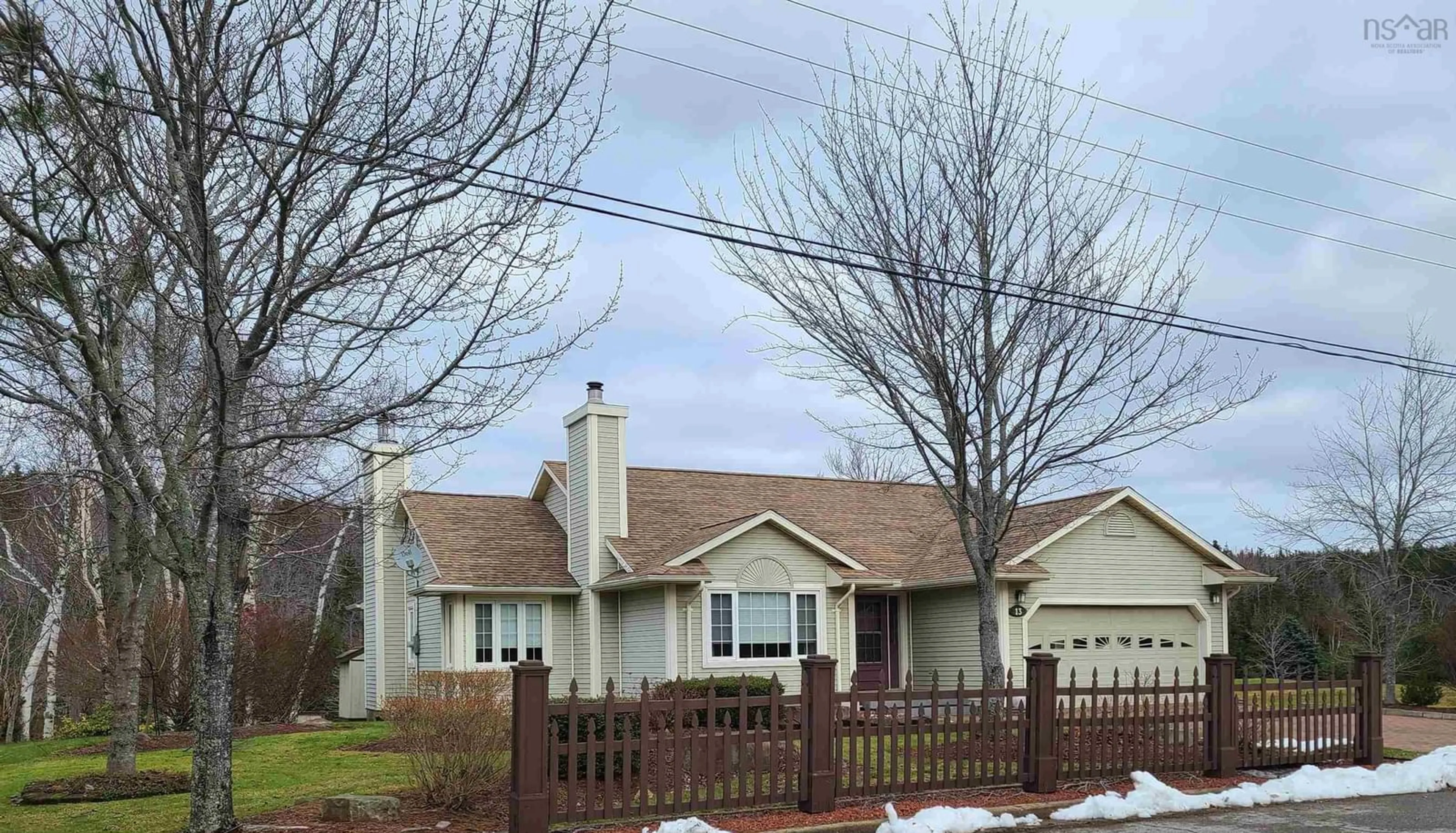 Home with vinyl exterior material, street for 13 J.D. Maclean Cres, Port Hawkesbury Nova Scotia B9A 2B1