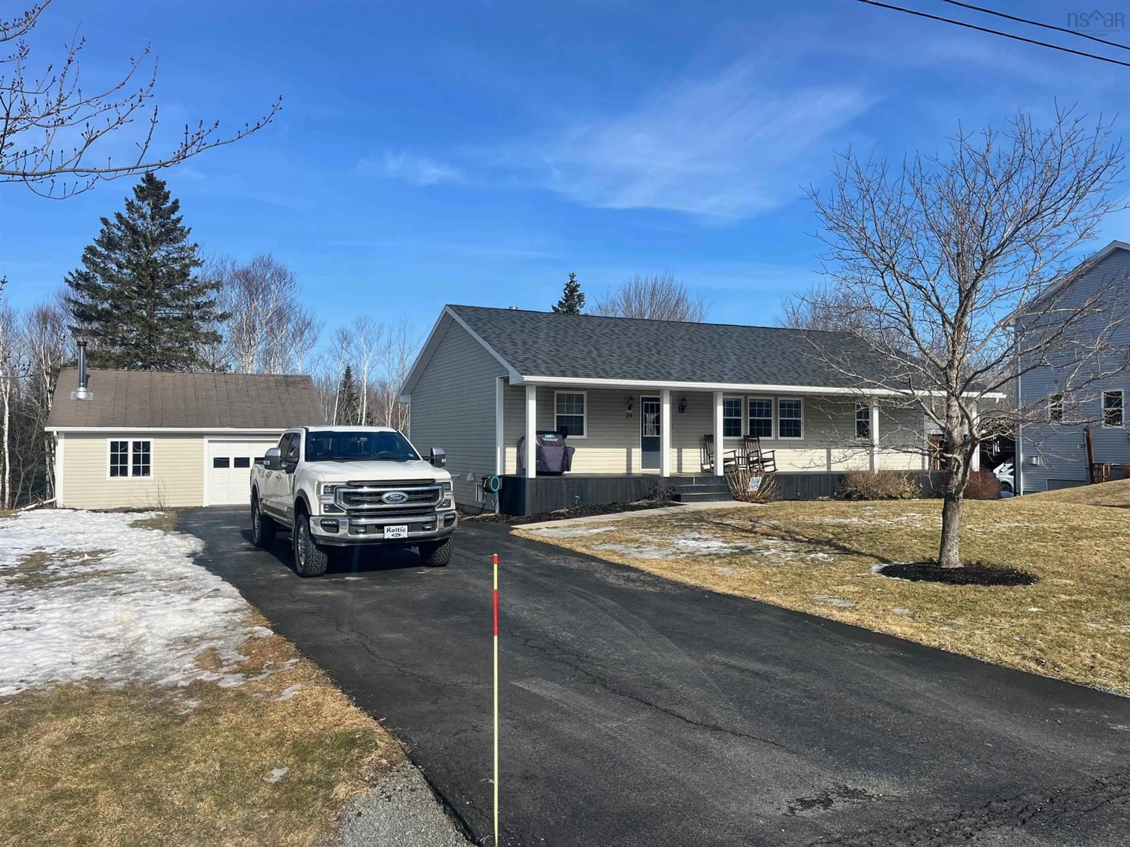 Home with vinyl exterior material, street for 29 Celtic Drive, St Andrew's Nova Scotia B0H 1X0