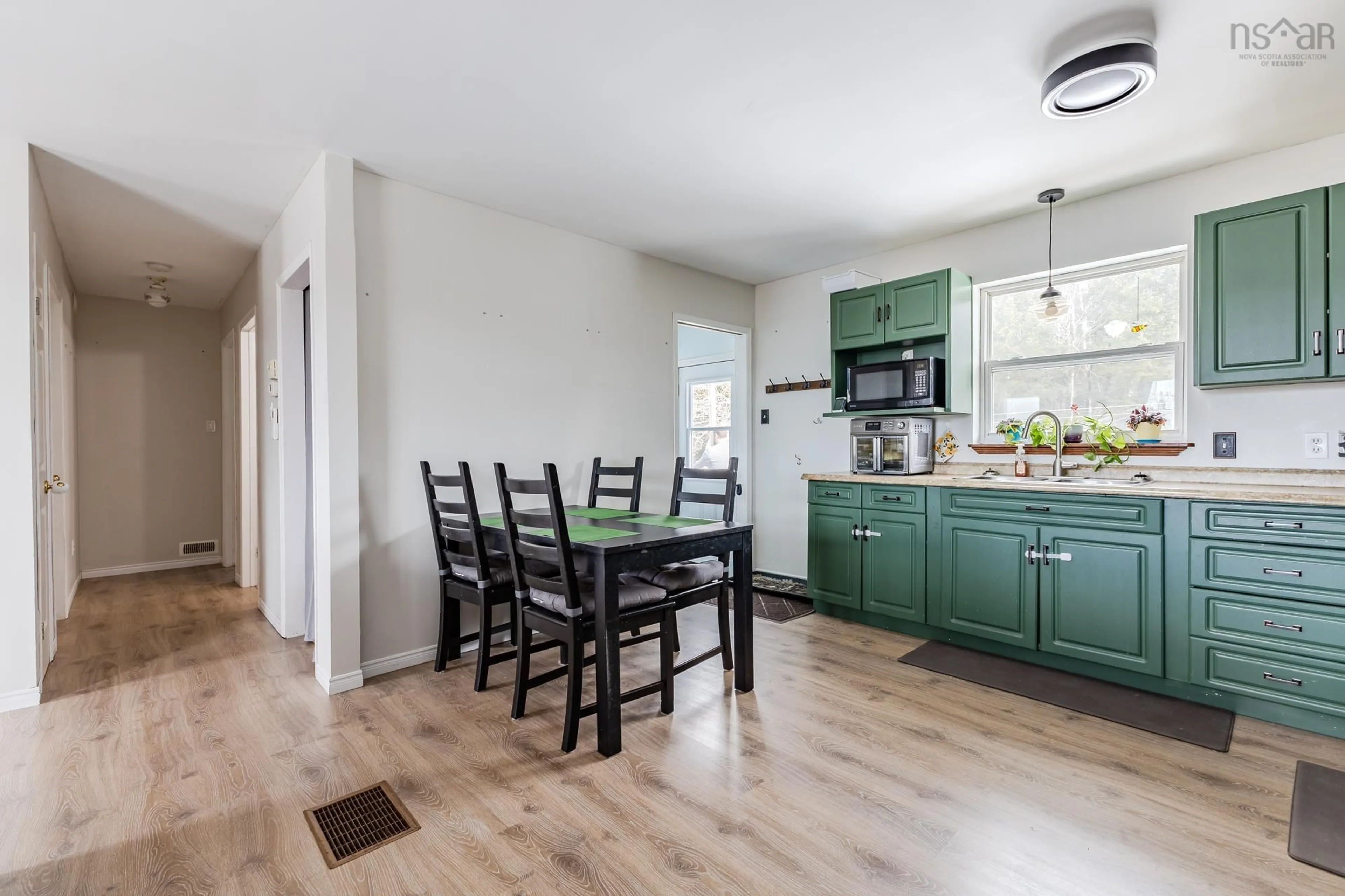 Open concept kitchen, wood/laminate floor for 119 Jeffery Lambert Dr, Hilden Nova Scotia B0N 1C0