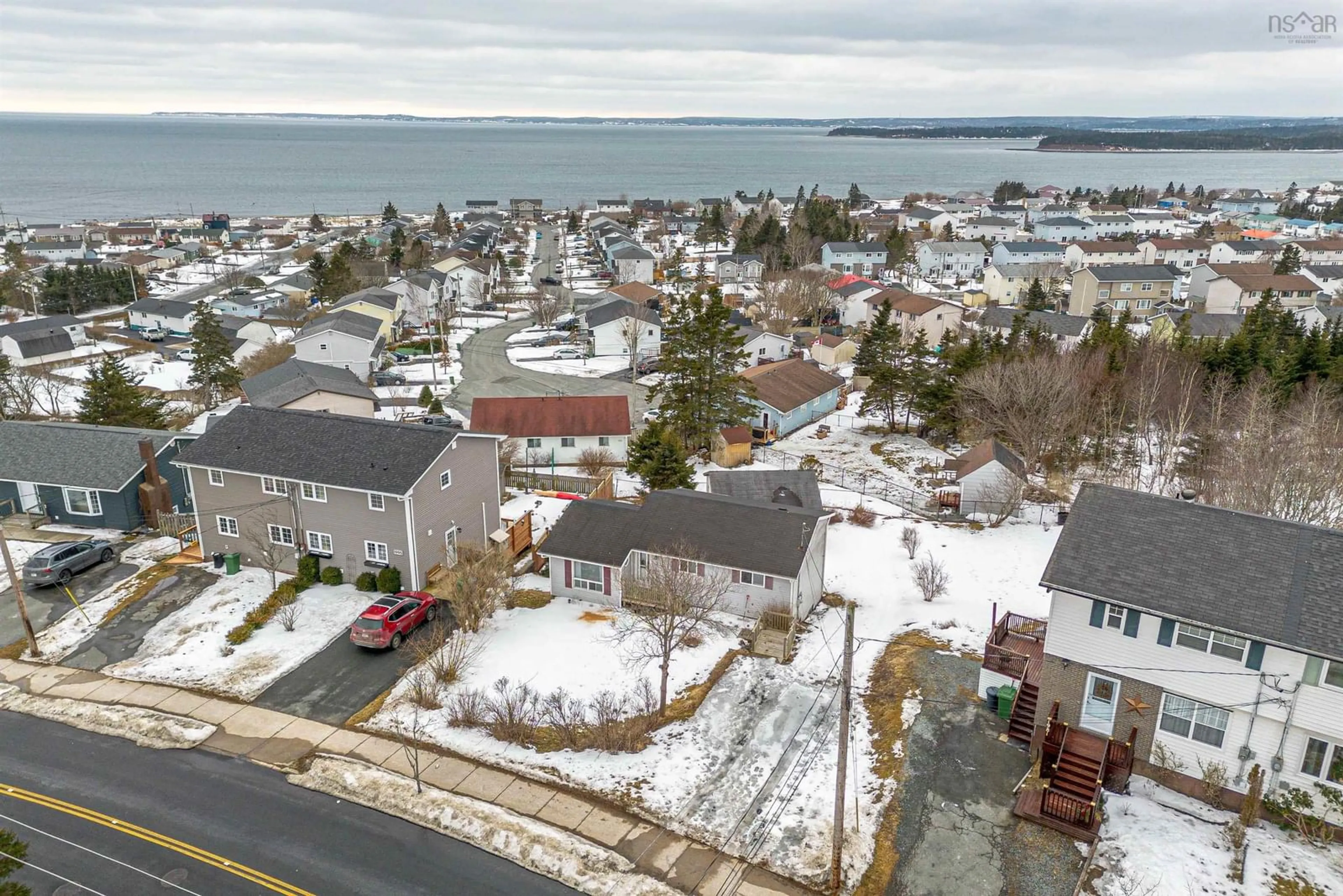 A pic from outside/outdoor area/front of a property/back of a property/a pic from drone, street for 1989 Caldwell Rd, Eastern Passage Nova Scotia B3G 1H9