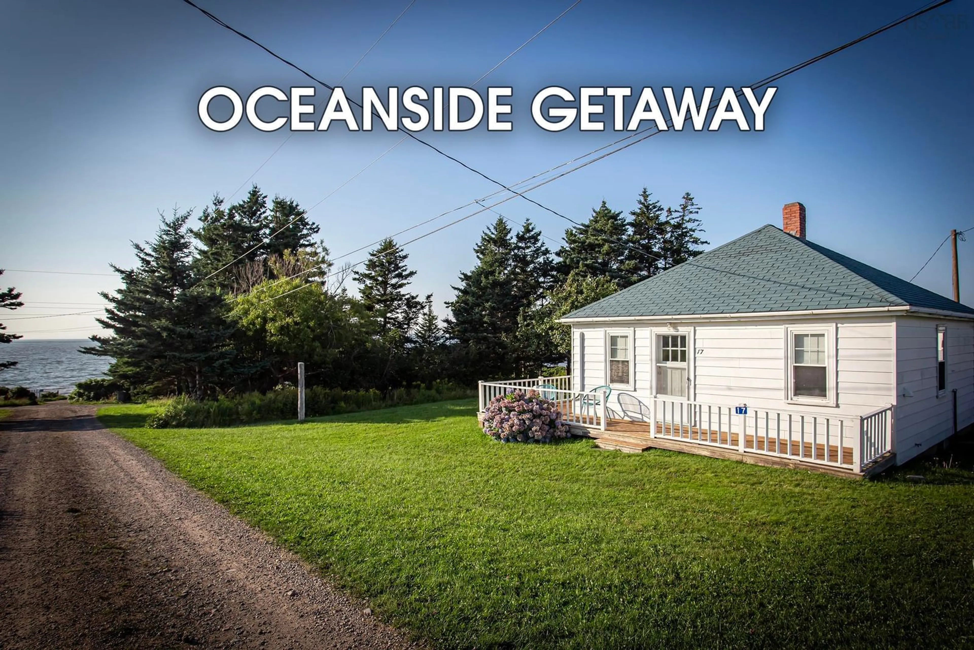 A pic from outside/outdoor area/front of a property/back of a property/a pic from drone, water/lake/river/ocean view for 17 Gordon Rd, Margaretsville Nova Scotia B0S 1N0