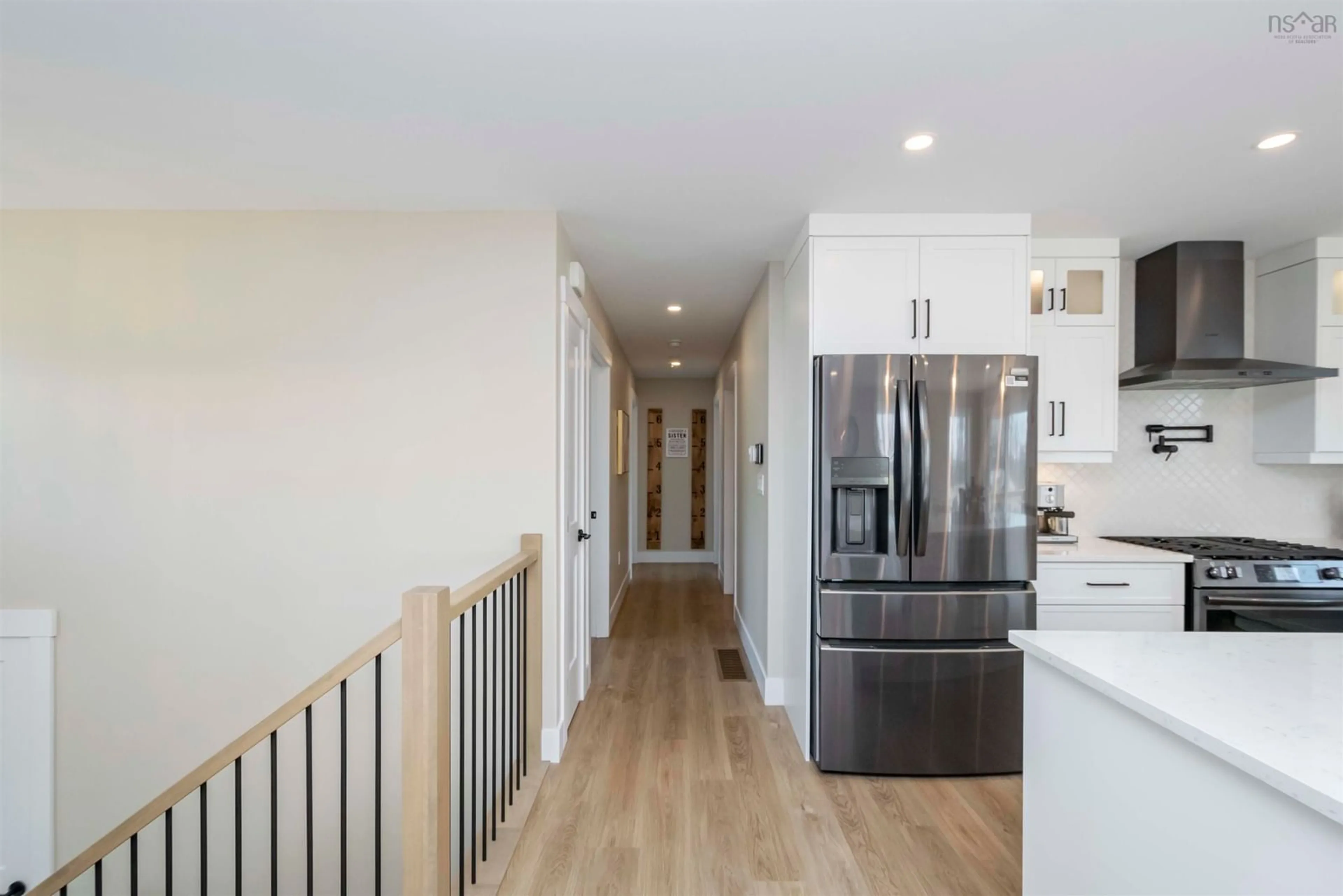 Open concept kitchen, wood/laminate floor for 40 Kata Court, Hammonds Plains Nova Scotia B3Z 1N8