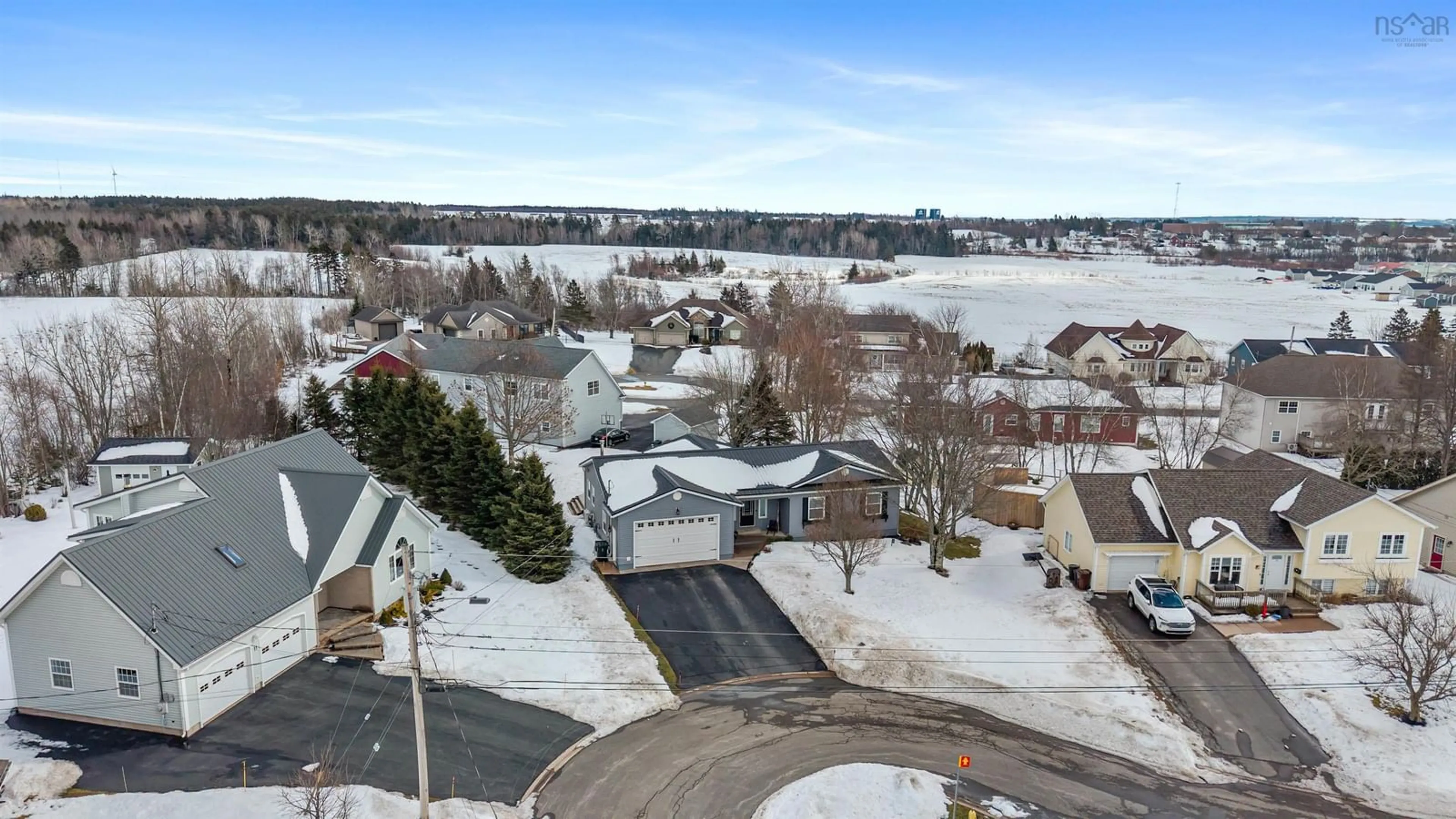 A pic from outside/outdoor area/front of a property/back of a property/a pic from drone, water/lake/river/ocean view for 9 Forest Glen Crt, Amherst Nova Scotia B4H 4T5