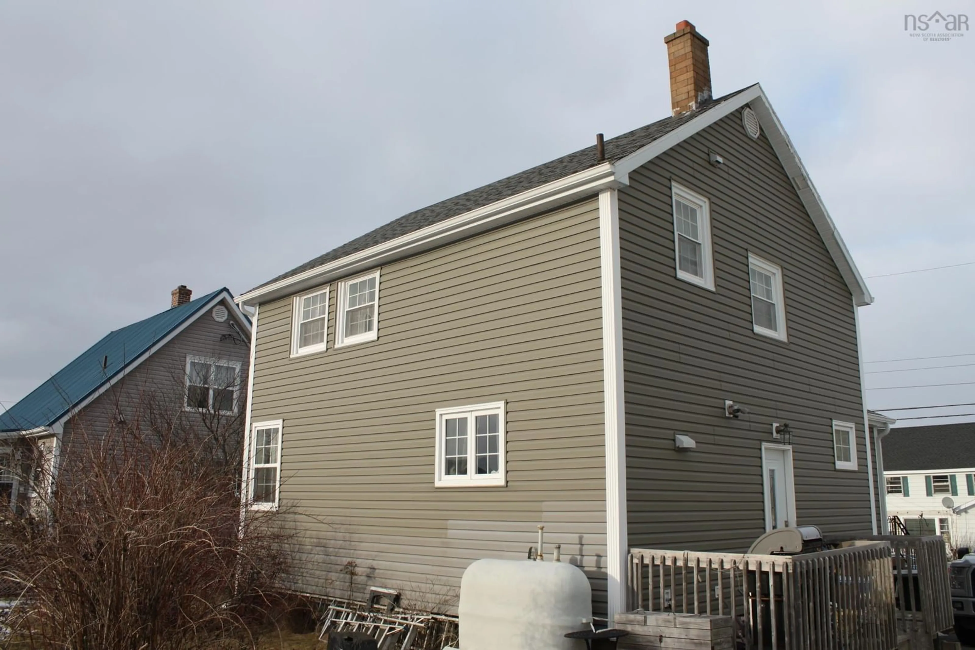 Home with vinyl exterior material, street for 64 Rosewood Dr, Sydney Nova Scotia B1P 3A8