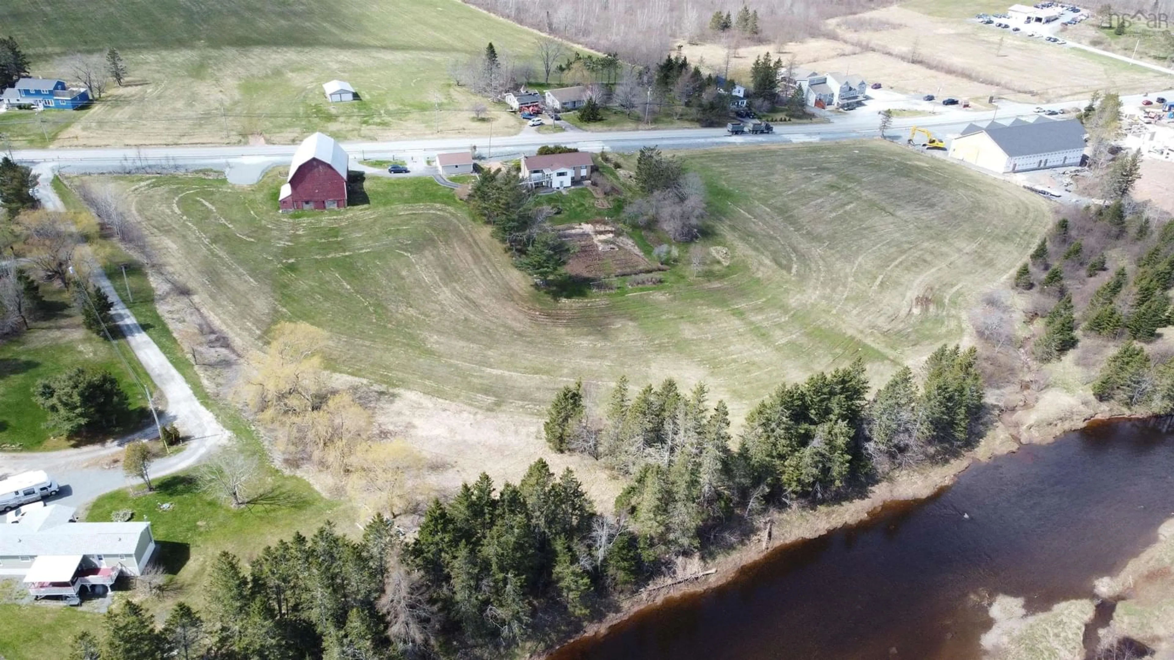 A pic from outside/outdoor area/front of a property/back of a property/a pic from drone, water/lake/river/ocean view for 373 214 Hwy, Elmsdale Nova Scotia B2S 2L8